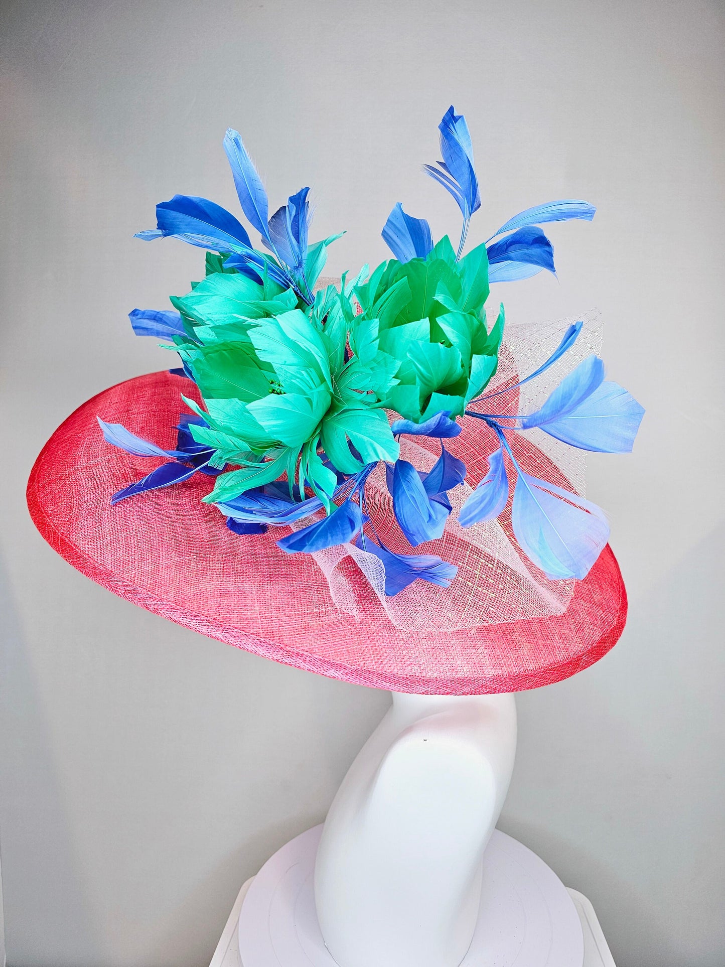 kentucky derby hat large wide brim sinamay coral hat w emerald green feather flowers, royal blue feathers and white ivory crinoline