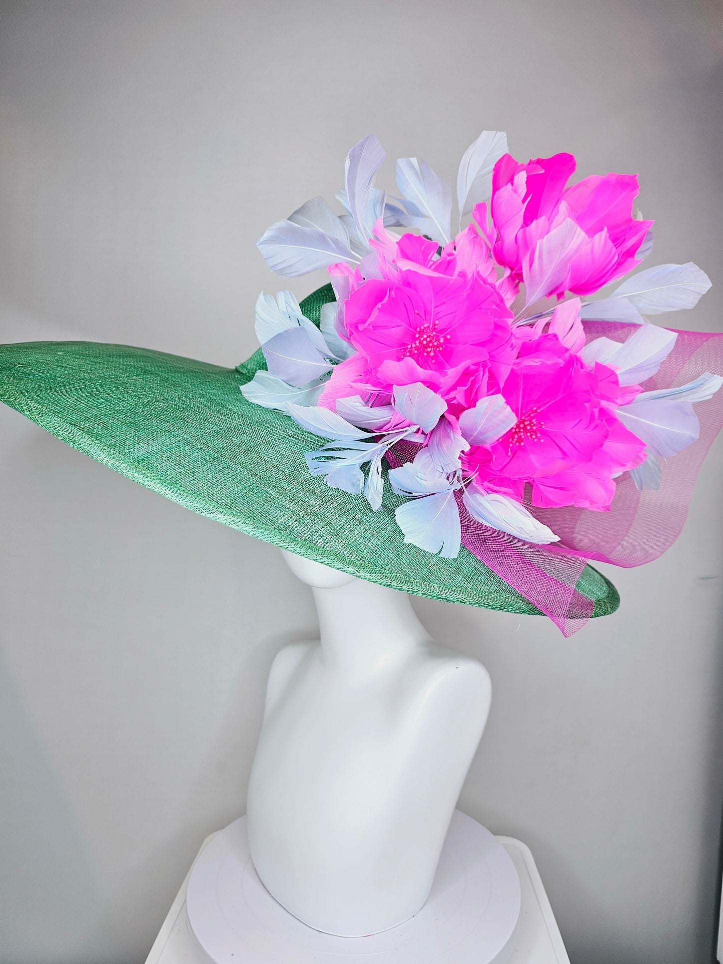 kentucky derby hat large wide brim sinamay emerald green hat with fuchsia pink feather flower and lavender feathers with pink crinoline