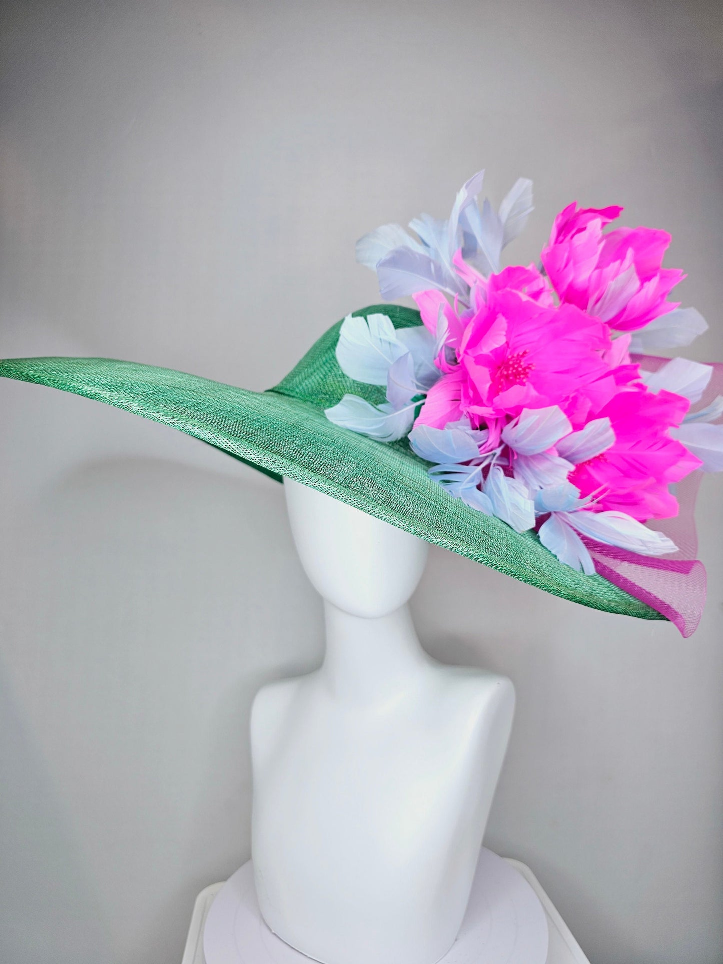 kentucky derby hat large wide brim sinamay emerald green hat with fuchsia pink feather flower and lavender feathers with pink crinoline