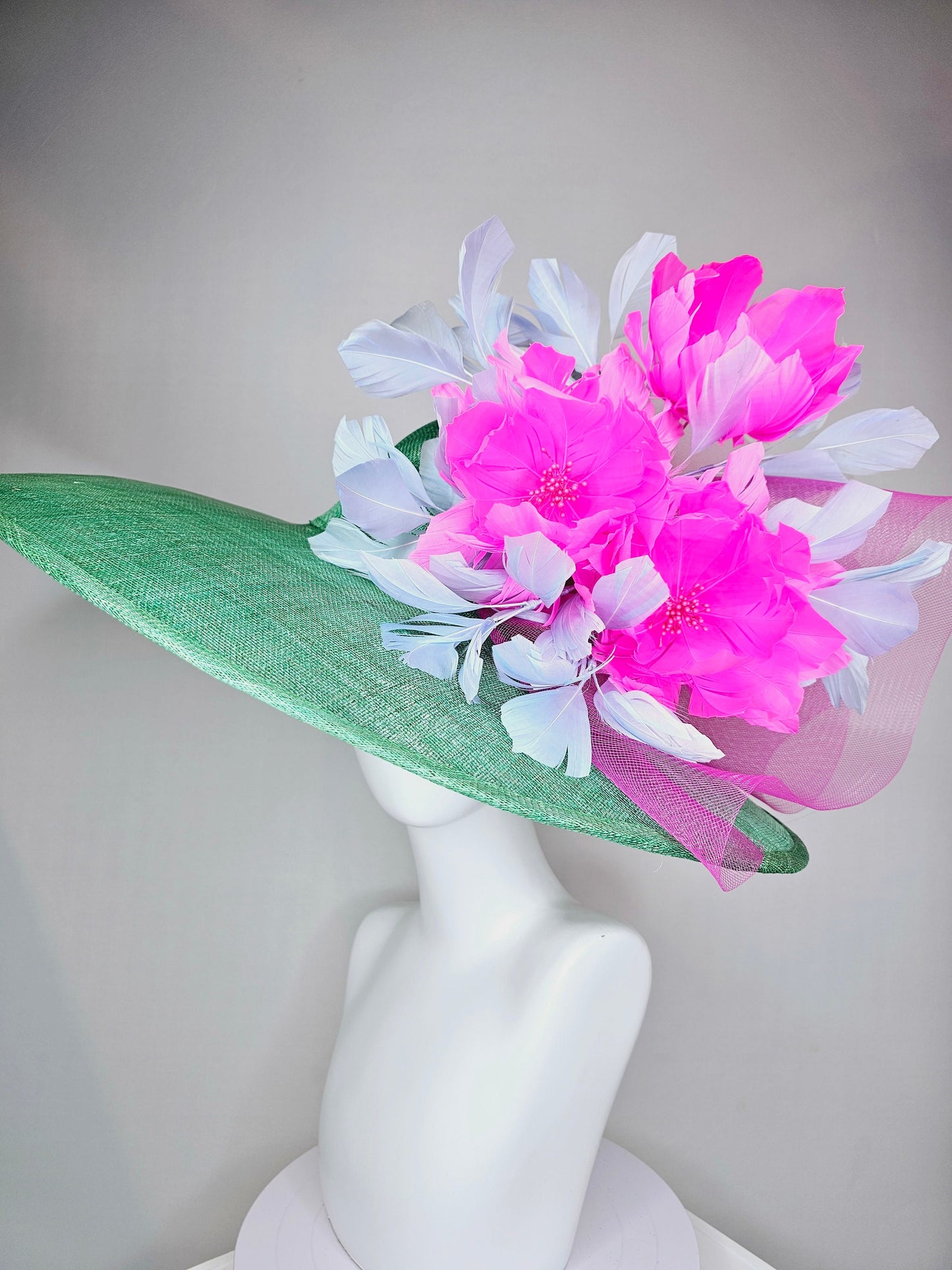 kentucky derby hat large wide brim sinamay emerald green hat with fuchsia pink feather flower and lavender feathers with pink crinoline