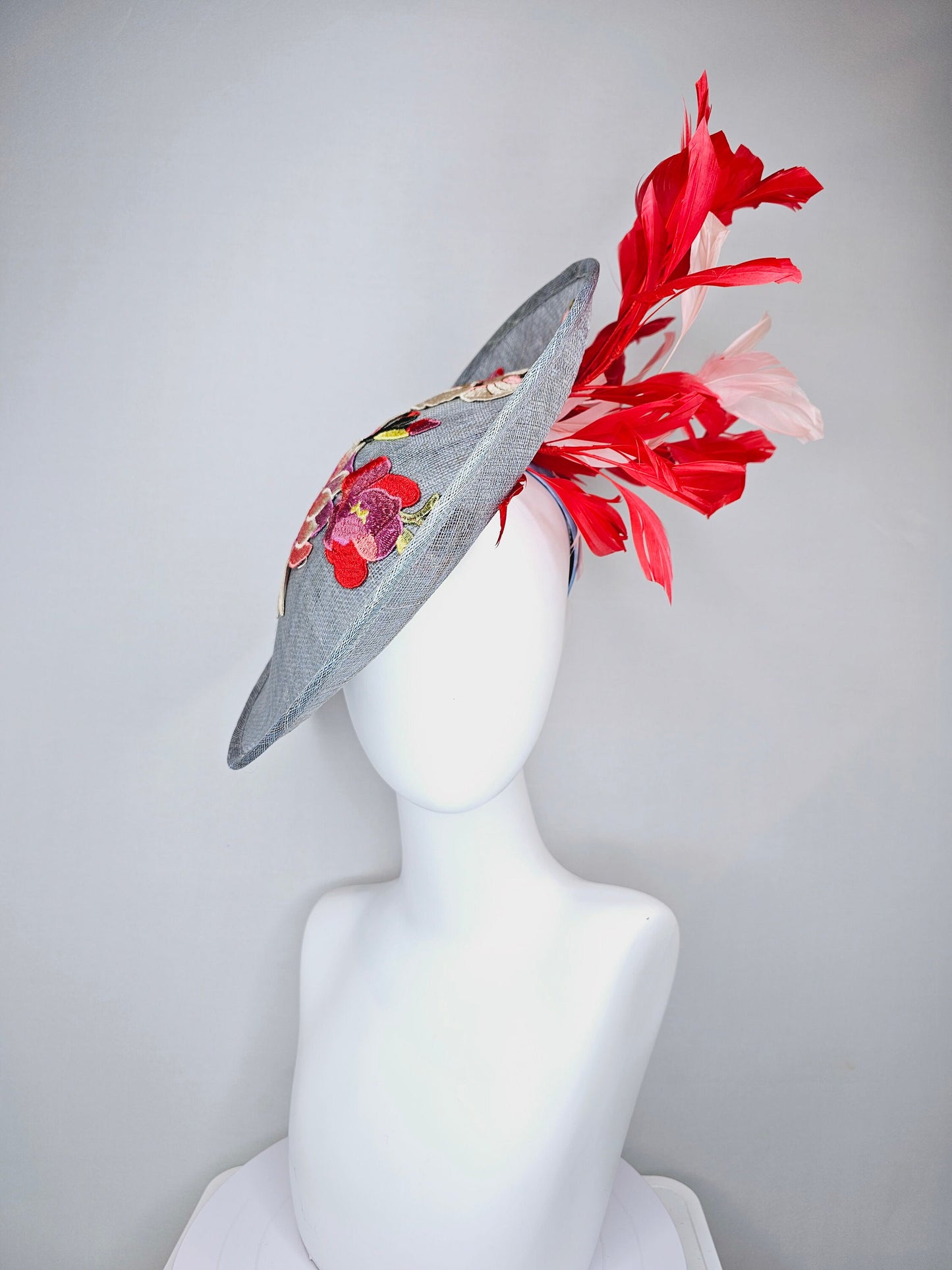 kentucky derby hat gray blue sinamay saucer with red burgundy pink embroidered flowers with blush light pink and red feathers