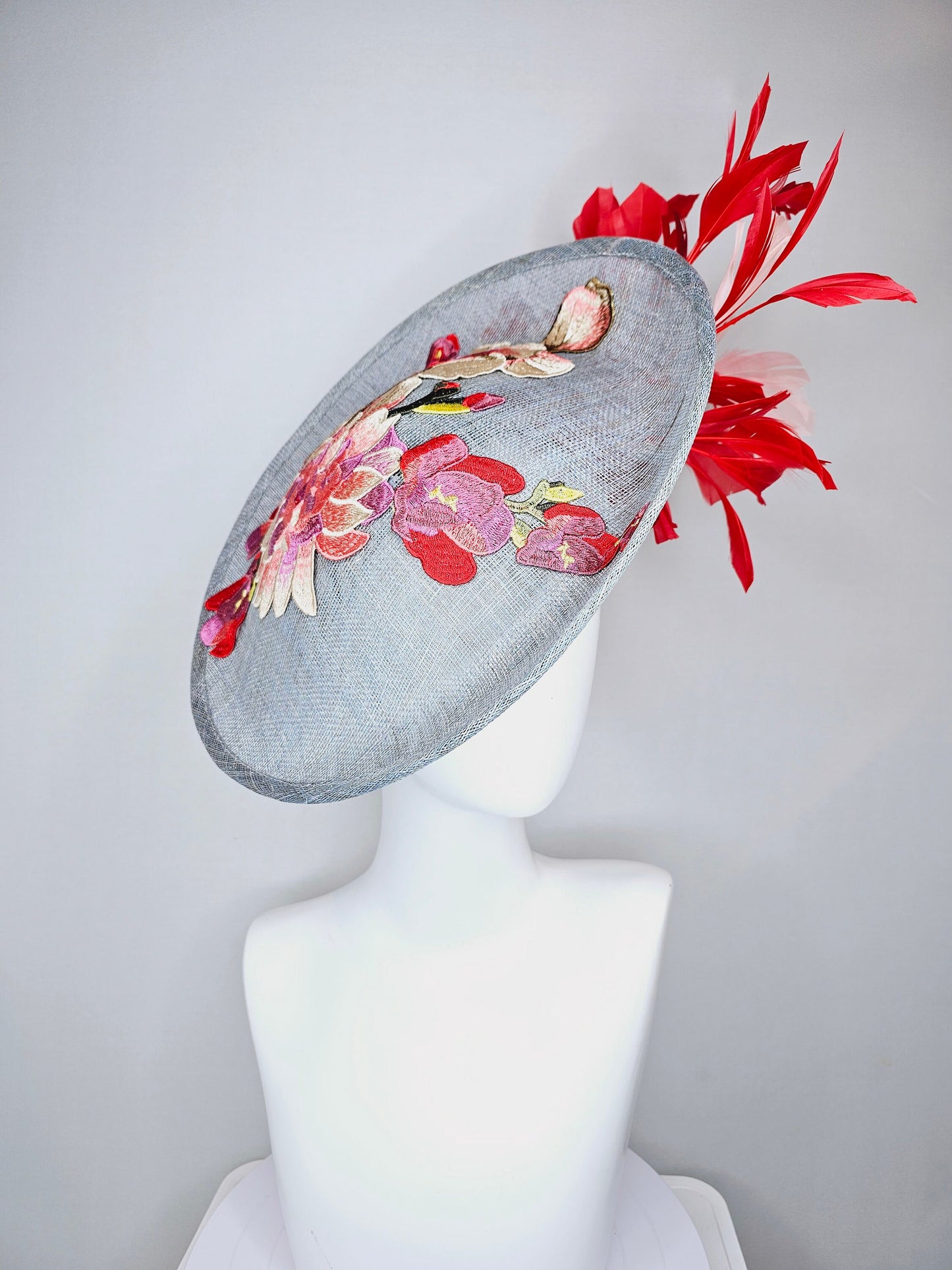 kentucky derby hat gray blue sinamay saucer with red burgundy pink embroidered flowers with blush light pink and red feathers