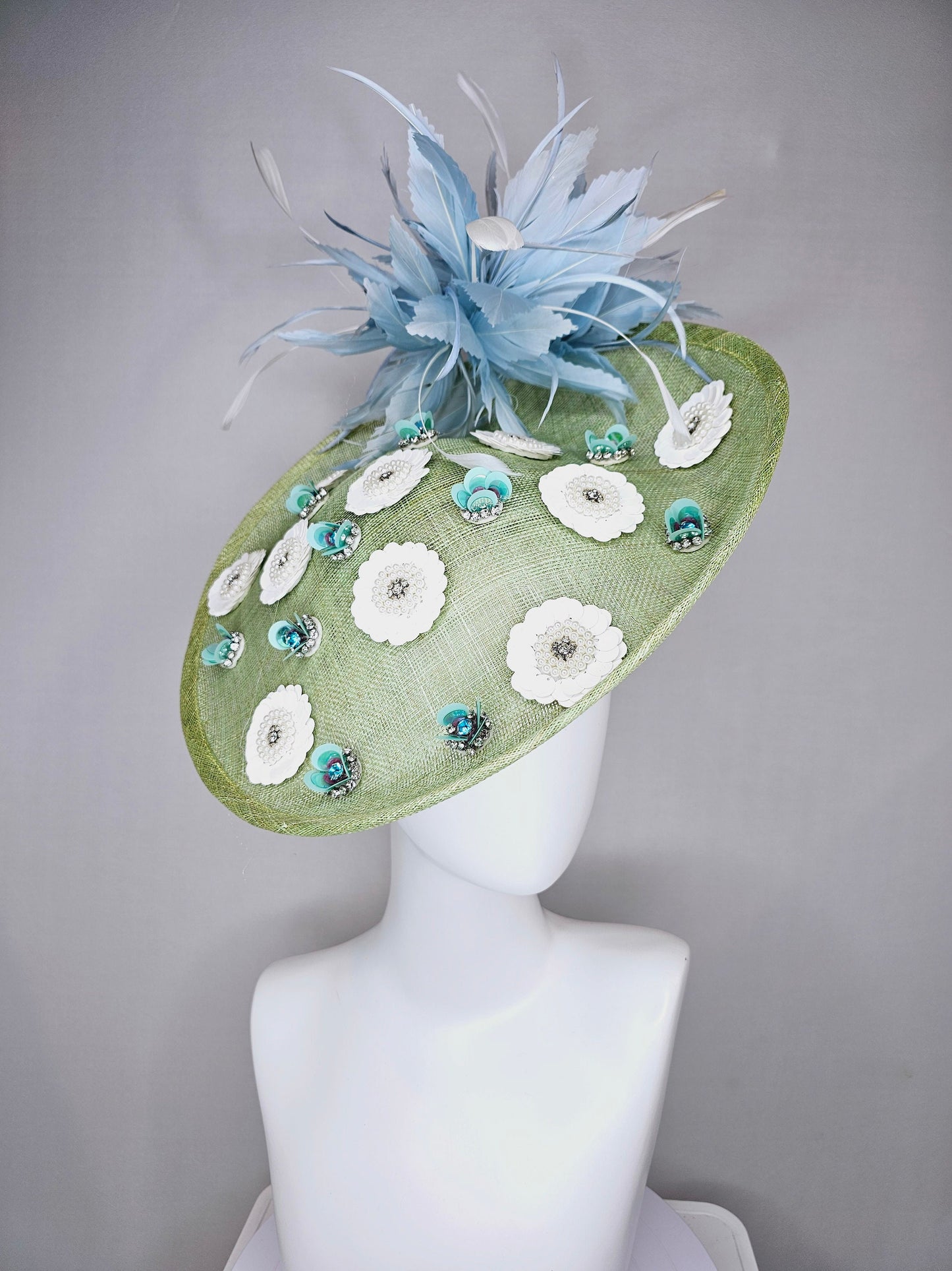 kentucky derby hat fascinator green sinamay saucer with white sequined pearls rhinestone beaded flowers and teal blue with ivory feathers