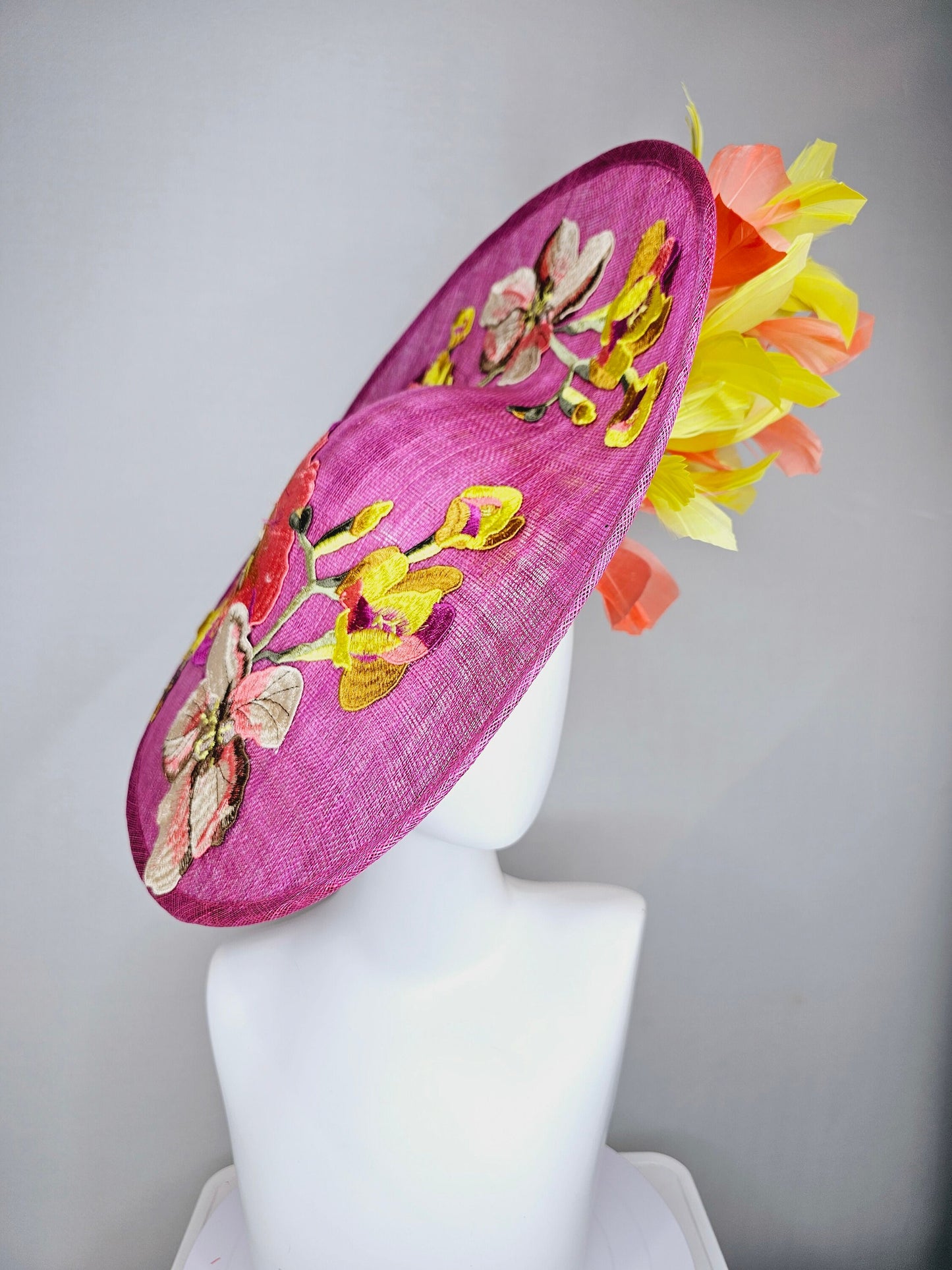 kentucky derby hat fascinator mulberry purple sinamay saucer with yellow coral purple pink embroidered flowers and peach yellow feathers