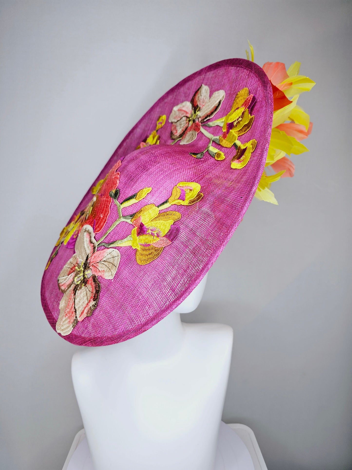 kentucky derby hat fascinator mulberry purple sinamay saucer with yellow coral purple pink embroidered flowers and peach yellow feathers