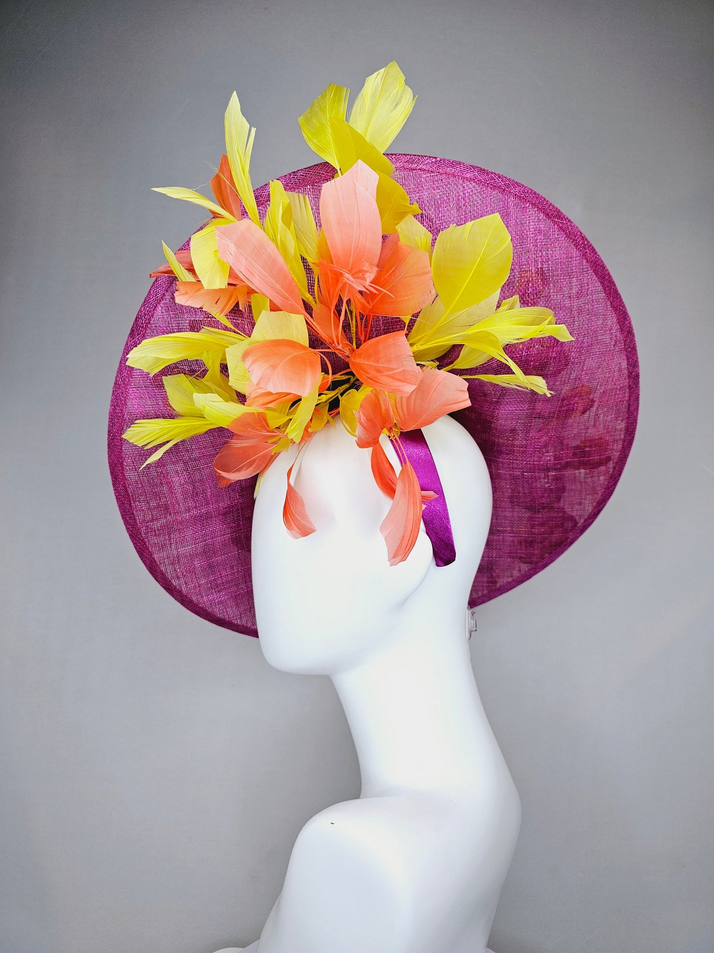 kentucky derby hat fascinator mulberry purple sinamay saucer with yellow coral purple pink embroidered flowers and peach yellow feathers