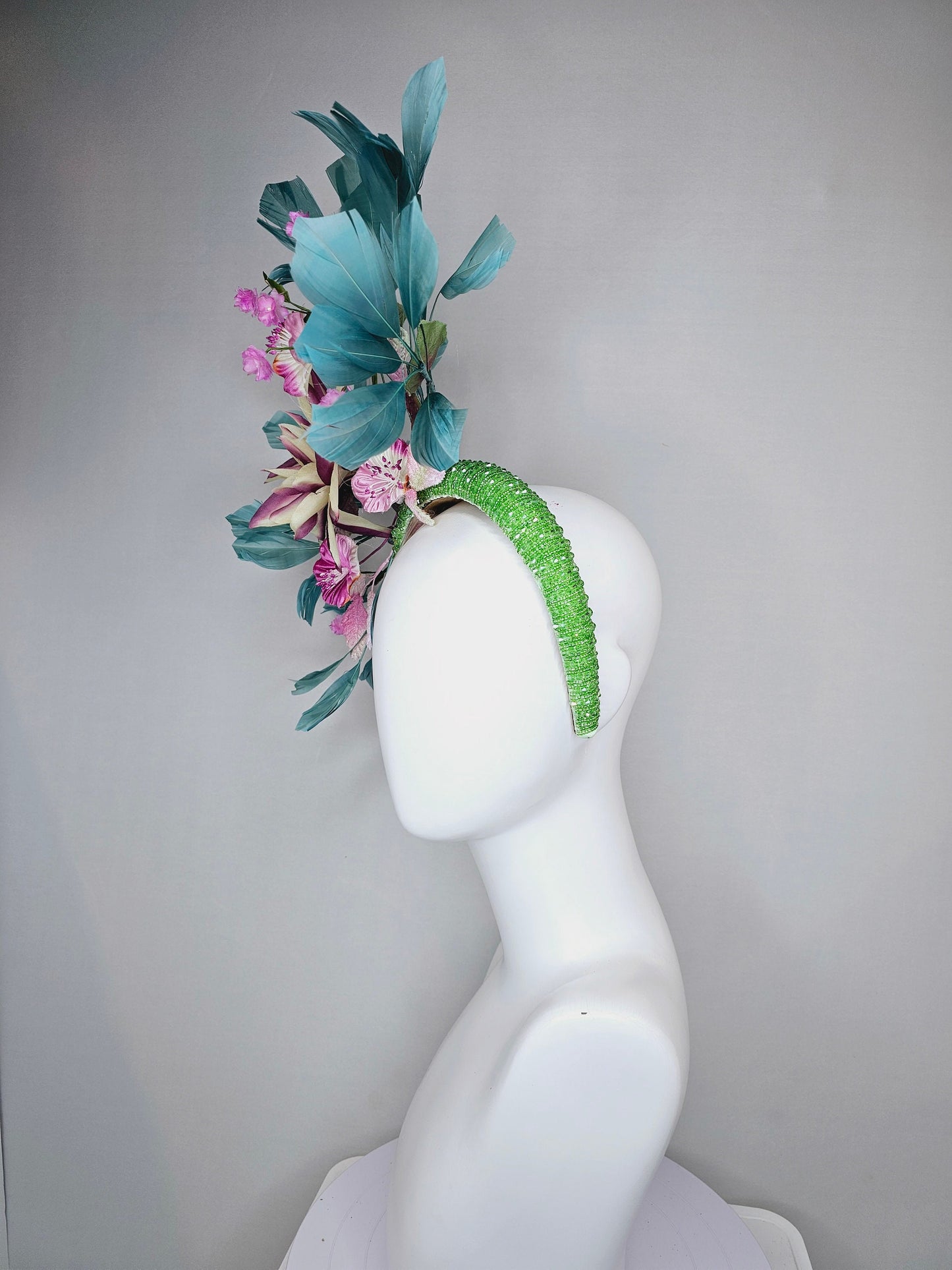 kentucky derby hat fascinator lime green beaded headband with cream purple silk flowers and pink flowers and teal feathers