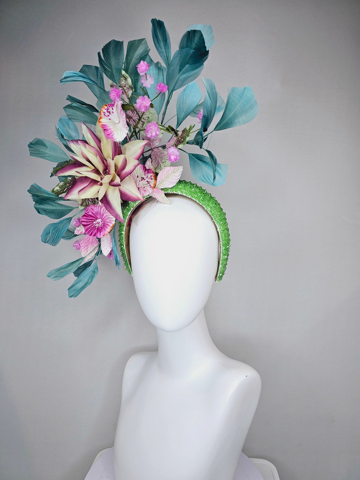 kentucky derby hat fascinator lime green beaded headband with cream purple silk flowers and pink flowers and teal feathers