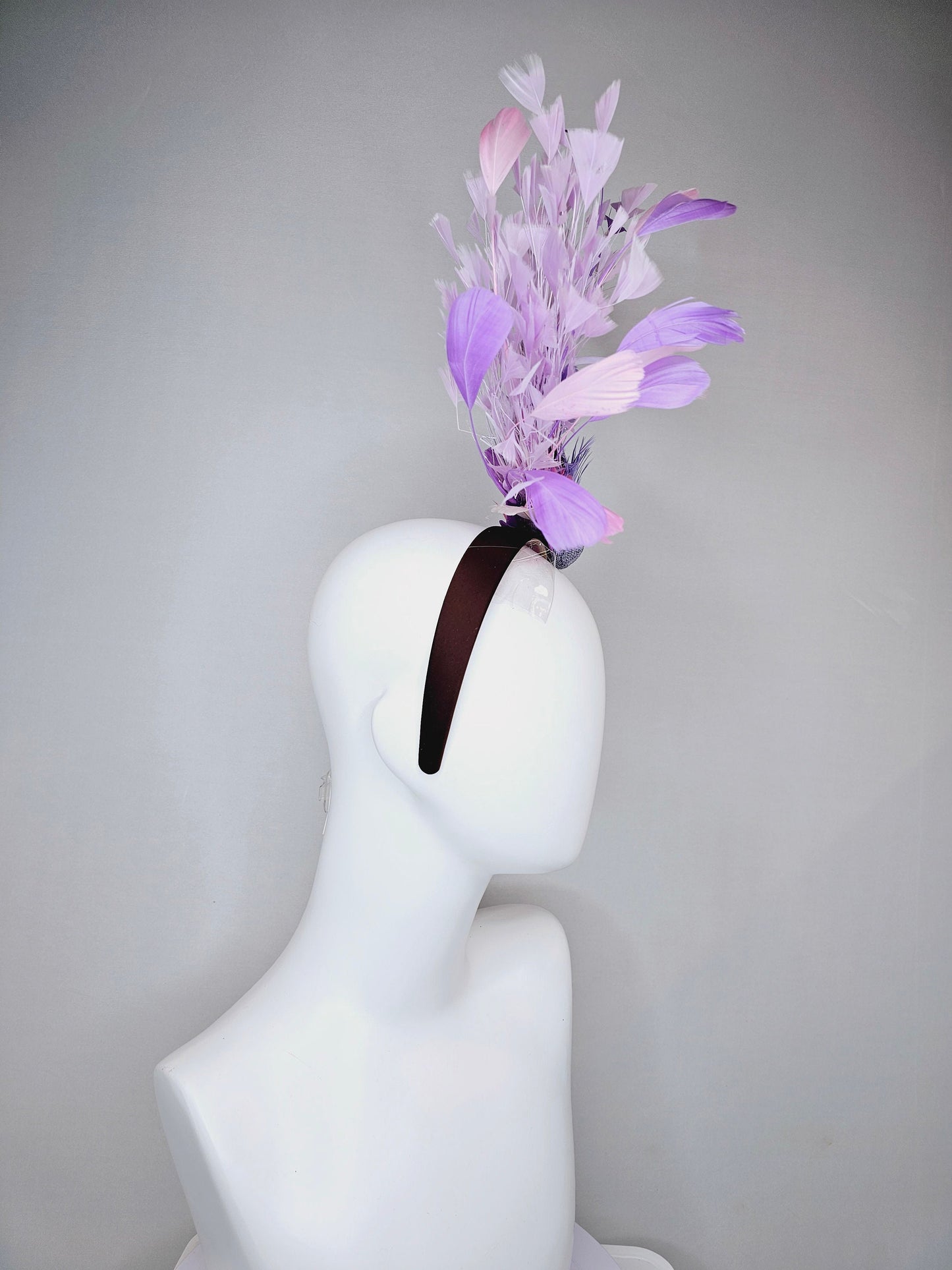 kentucky derby hat fascinator dark brown brunette satin headband with purple bird and purple lavender pink feathers