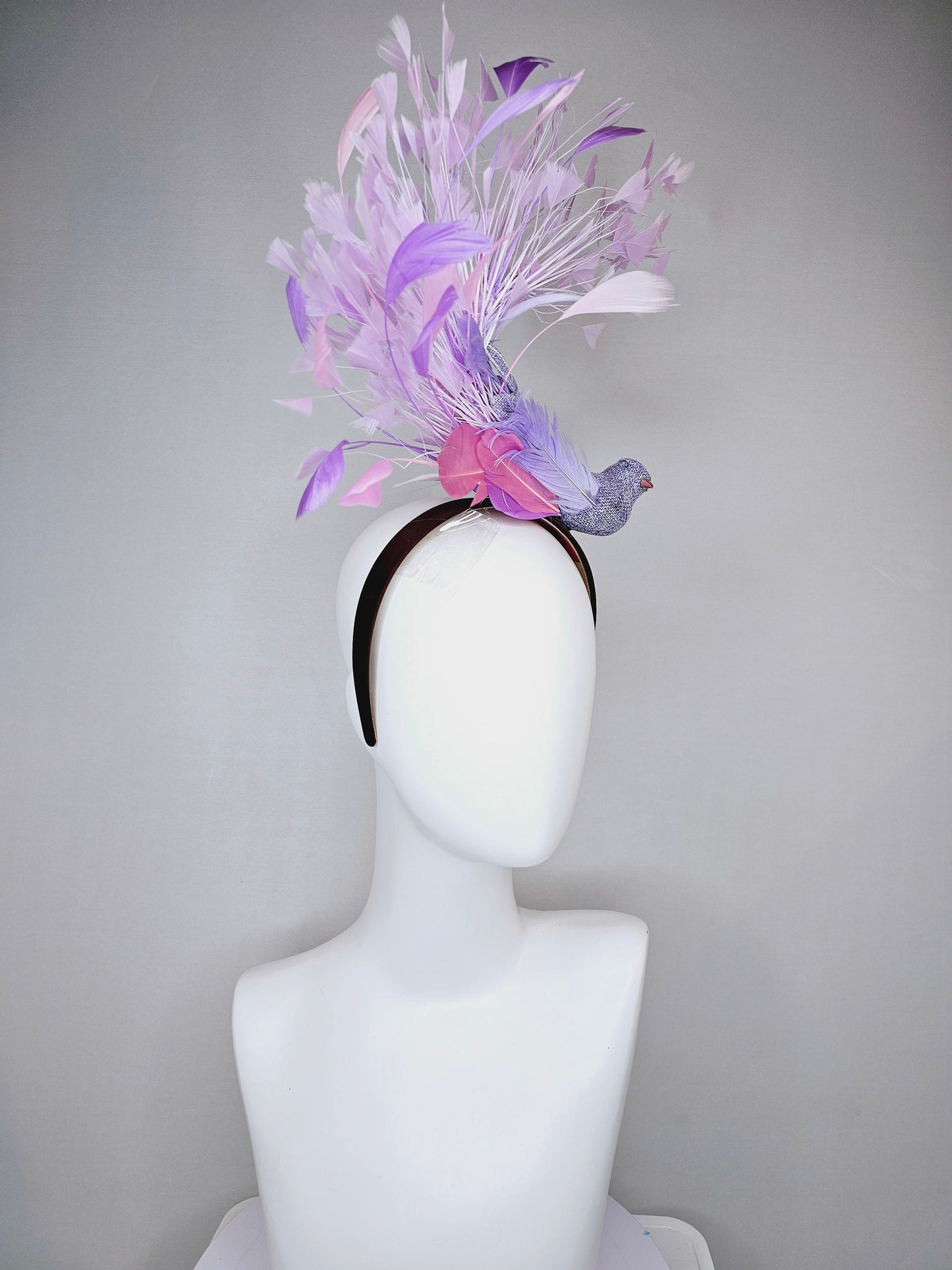 kentucky derby hat fascinator dark brown brunette satin headband with purple bird and purple lavender pink feathers