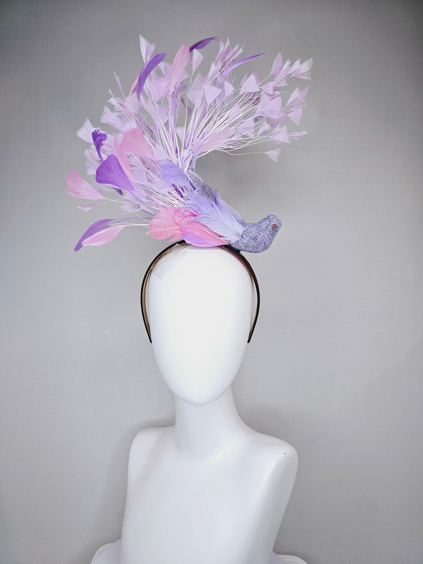 kentucky derby hat fascinator dark brown brunette satin headband with purple bird and purple lavender pink feathers