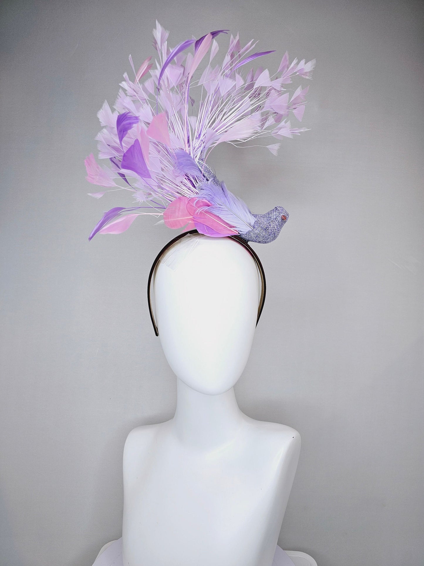 kentucky derby hat fascinator dark brown brunette satin headband with purple bird and purple lavender pink feathers