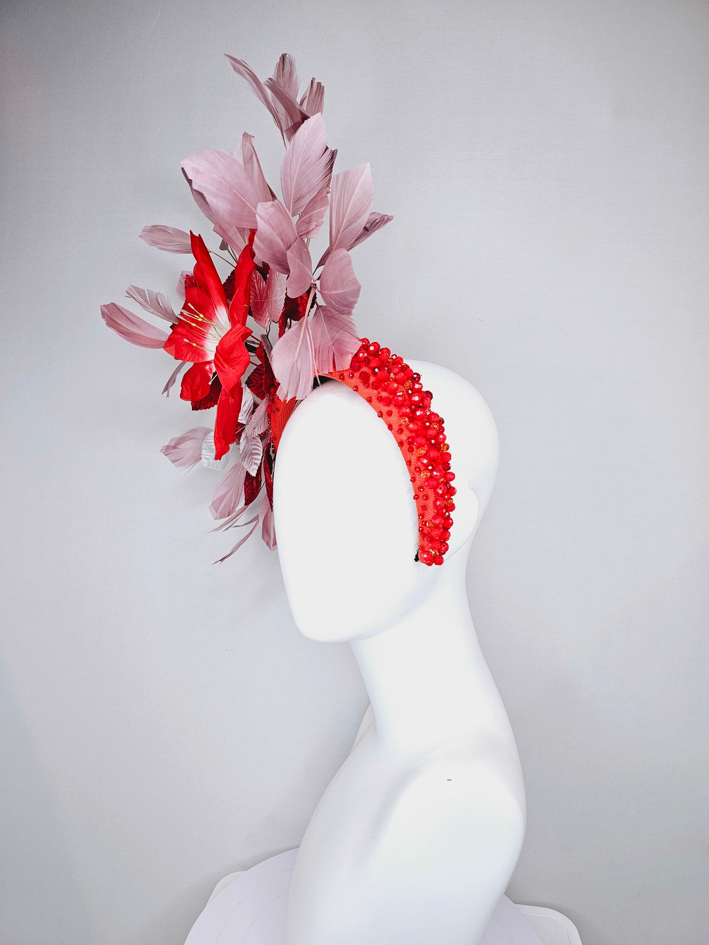 kentucky derby hat fascinator large red flower with red and white leaves with blush pink feathers on red crystal beaded headband