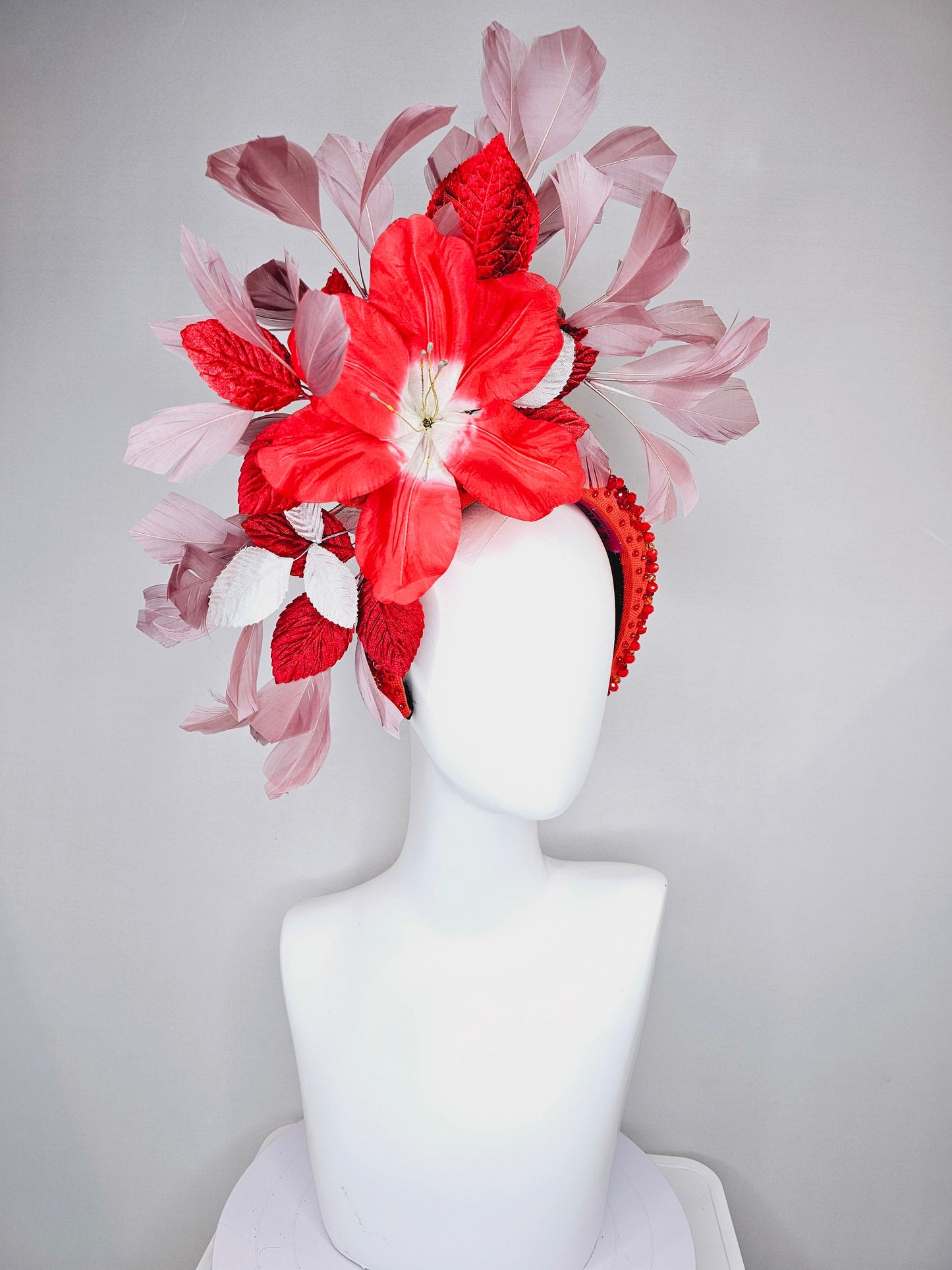 kentucky derby hat fascinator large red flower with red and white leaves with blush pink feathers on red crystal beaded headband