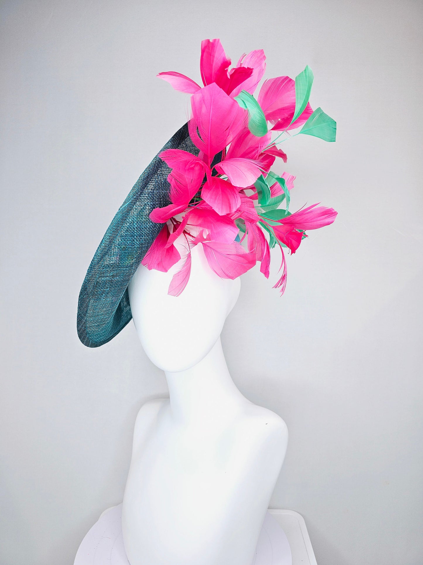 kentucky derby hat fascinator teal sinamay saucer with fuchsia pink and green feathers and yellow pink blue embroidered flowers and birds