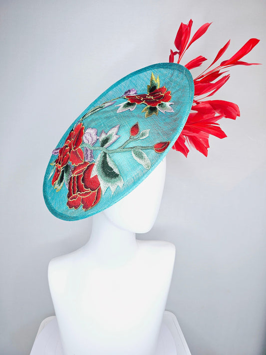 kentucky derby hat fascinator teal turquoise aqua blue sinamay saucer with purple red gold green embroidered flowers with red feathers