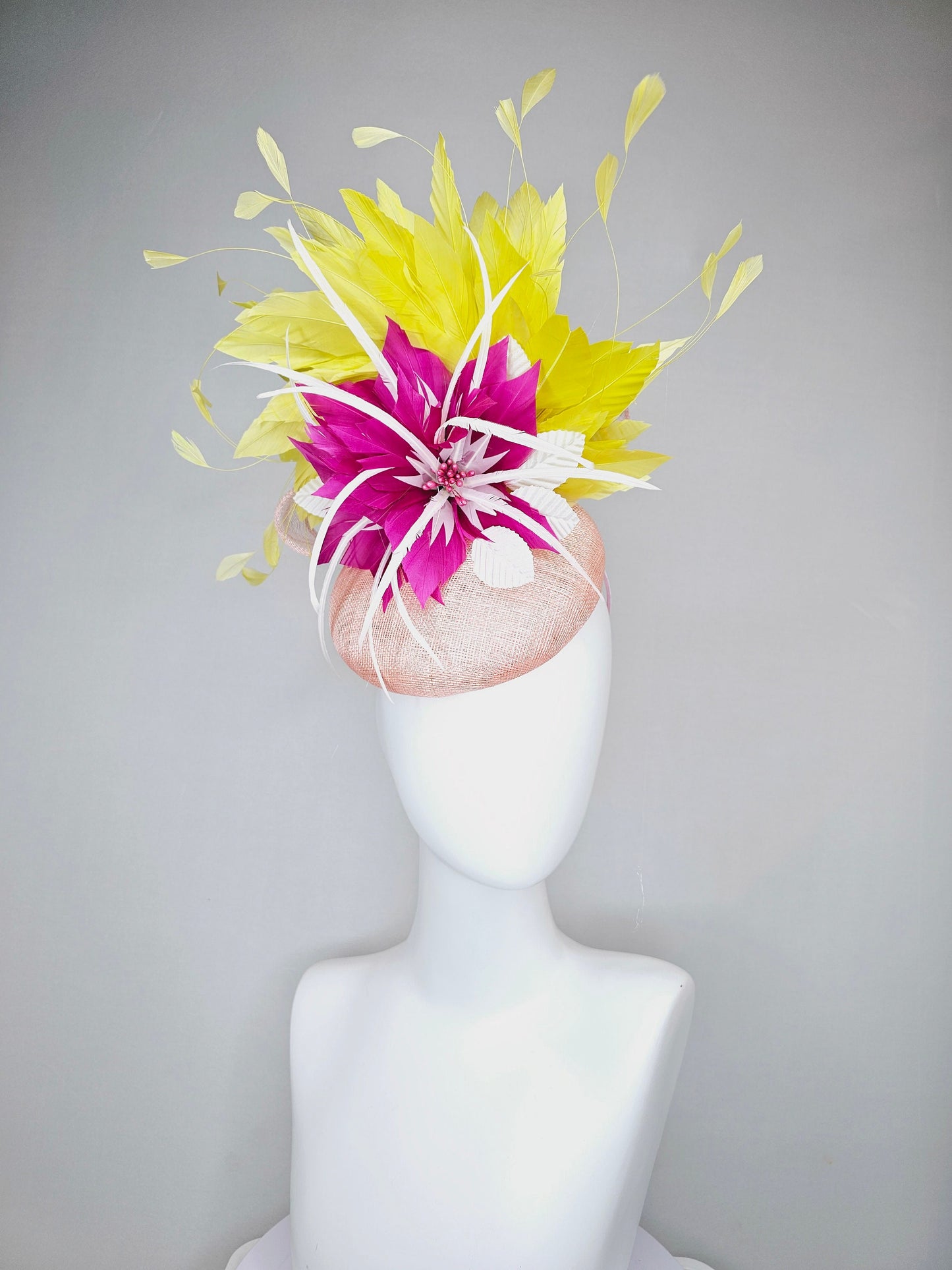 kentucky derby hat fascinator light pink sinamay with large fuchsia pink and white feather flowers,and branching bright yellow feathers