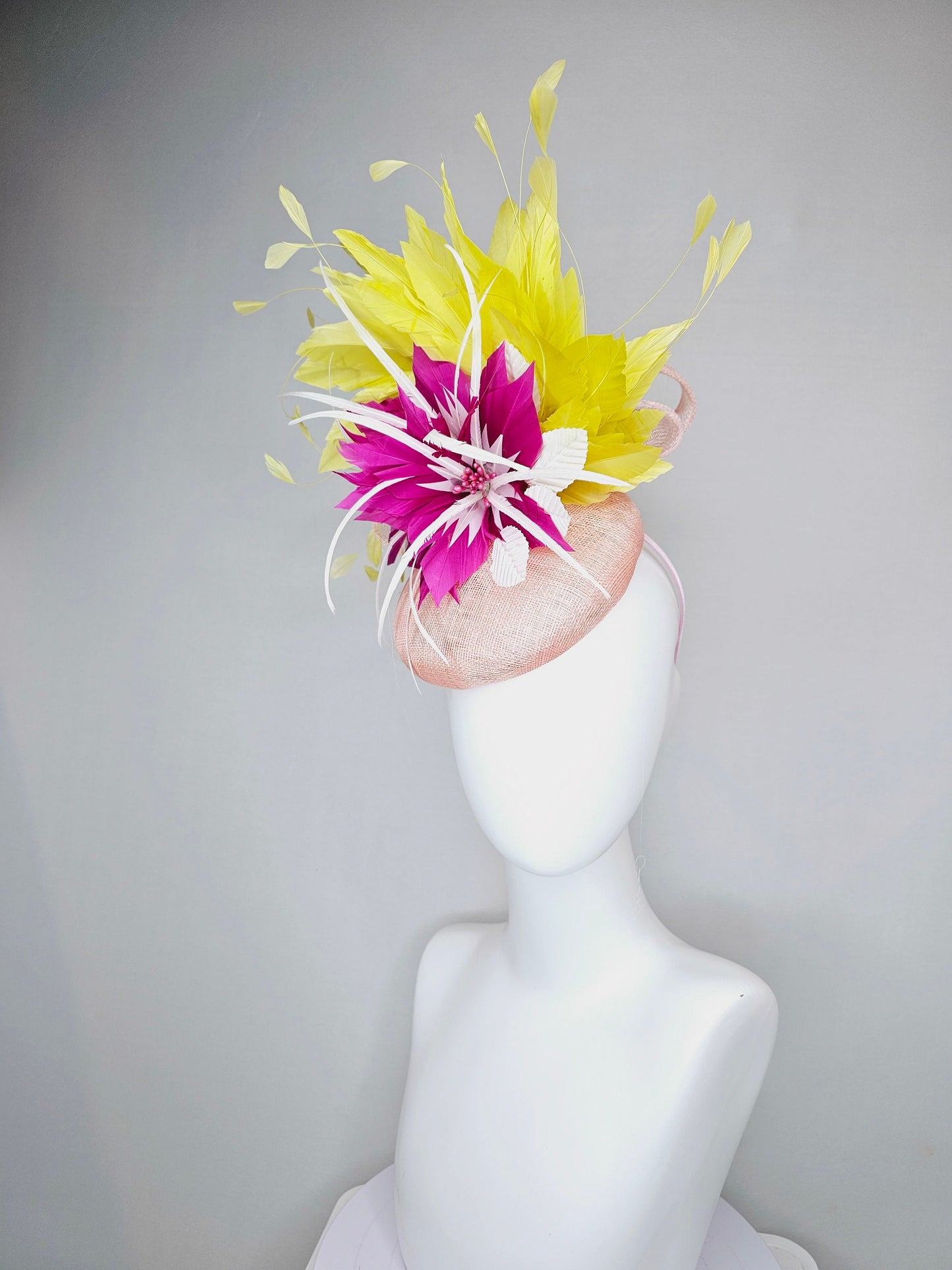 kentucky derby hat fascinator light pink sinamay with large fuchsia pink and white feather flowers,and branching bright yellow feathers