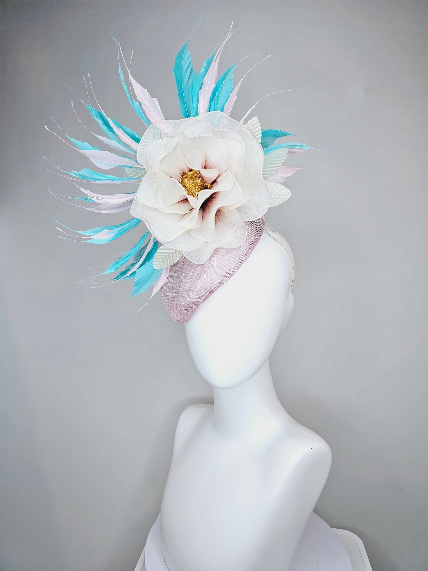 kentucky derby hat fascinator blush light pink sinamay with aqua turquoise blue white feathers and large ivory cream flower with gold core