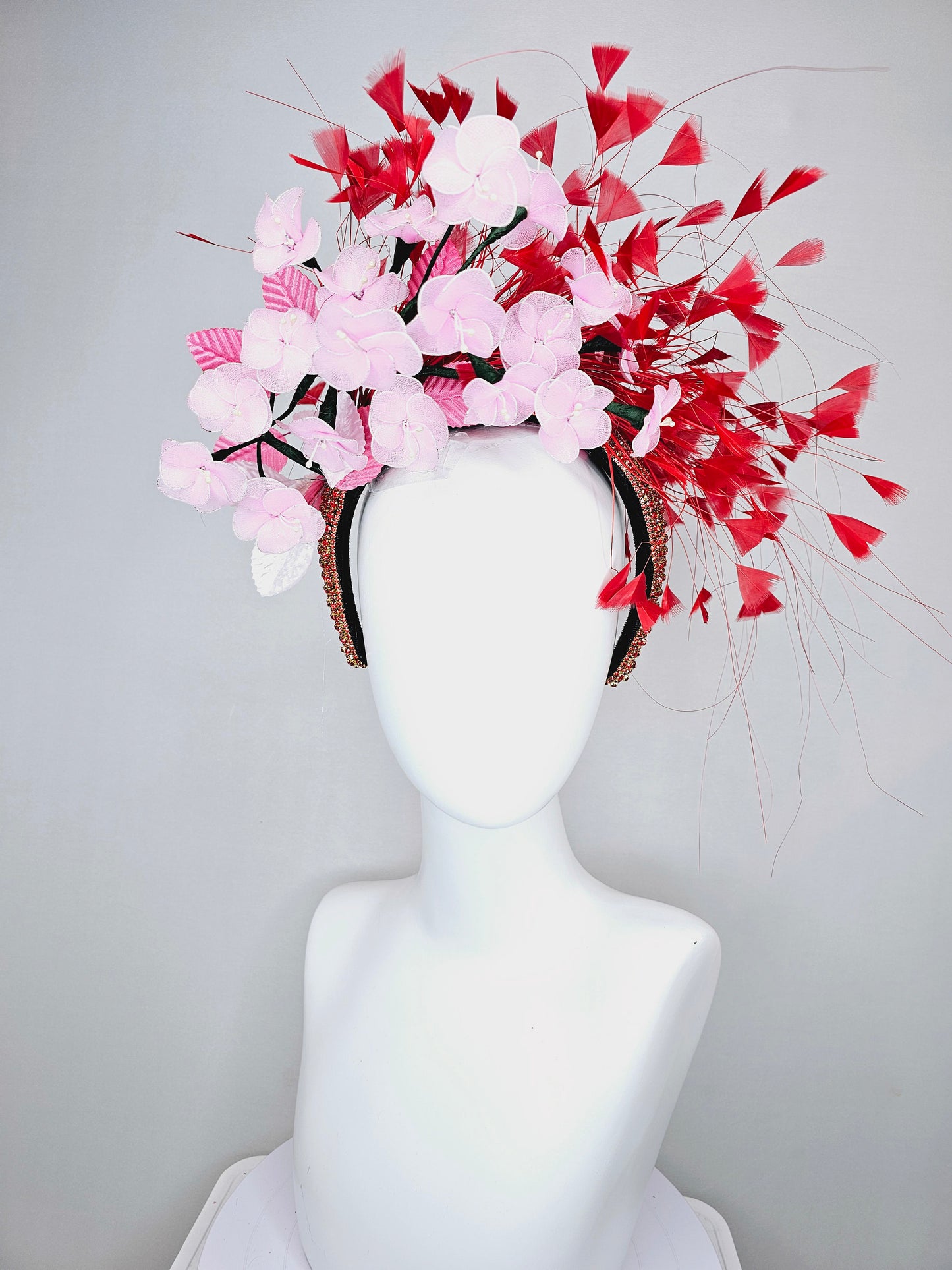 kentucky derby hat fascinator red rhinestone crystal headband,light pink wire mesh flowers,pink velvet leaves,and red branching feathers