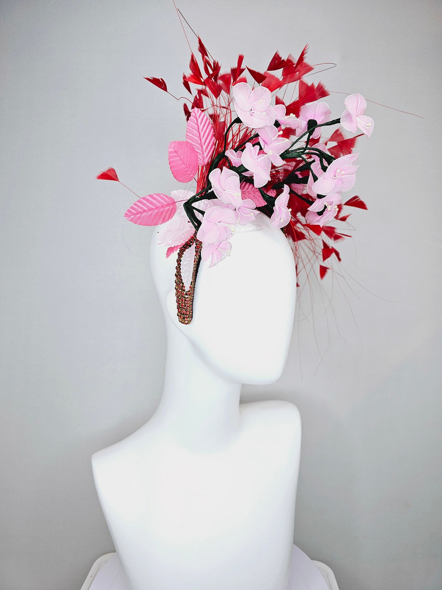 kentucky derby hat fascinator red rhinestone crystal headband,light pink wire mesh flowers,pink velvet leaves,and red branching feathers