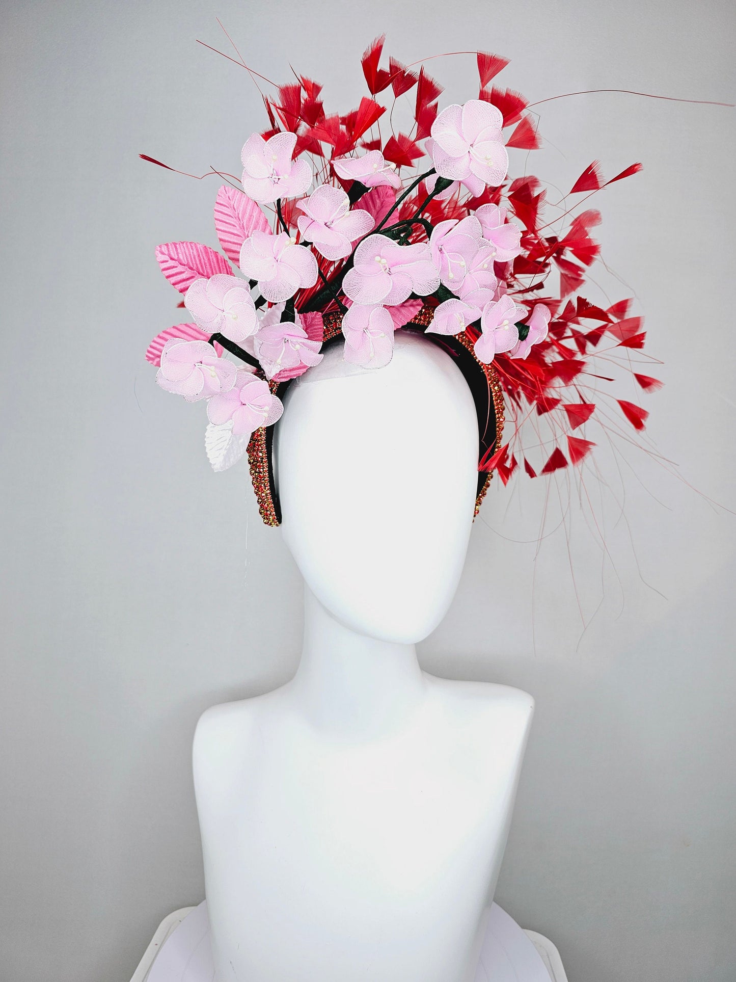 kentucky derby hat fascinator red rhinestone crystal headband,light pink wire mesh flowers,pink velvet leaves,and red branching feathers