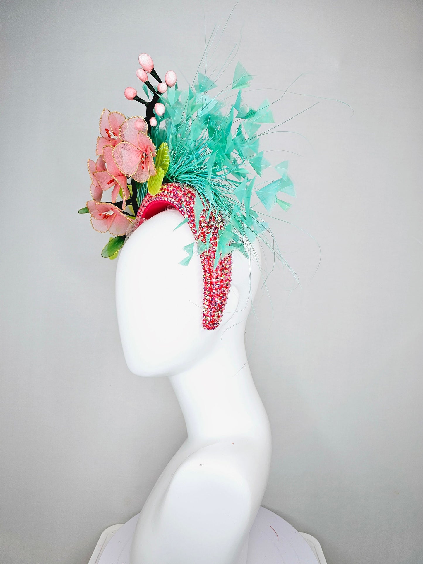 kentucky derby hat fascinator turquoise blue feathers on iridescent crystal coral headband with peach pink wire mesh flowers,green leaves