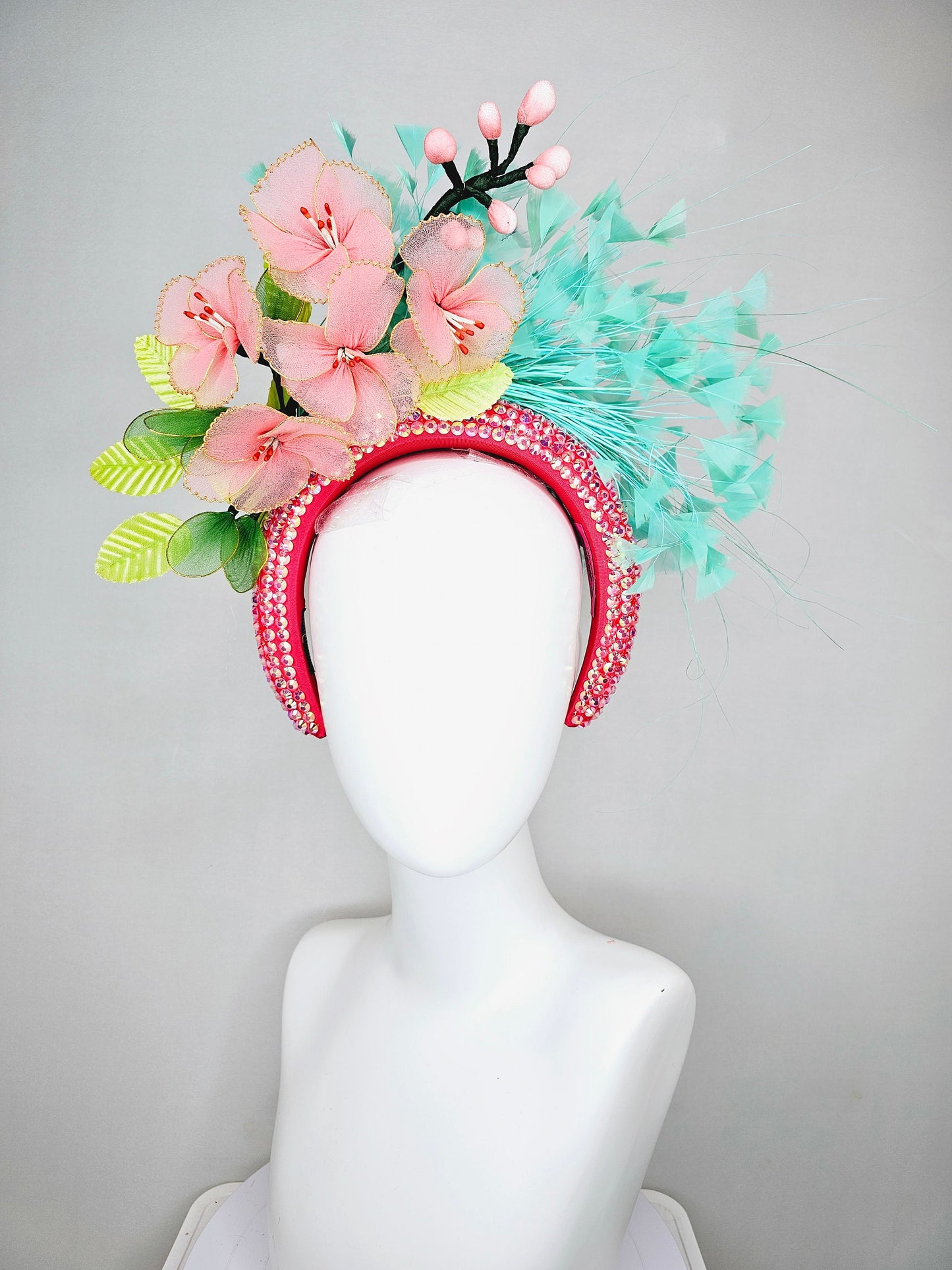 kentucky derby hat fascinator turquoise blue feathers on iridescent crystal coral headband with peach pink wire mesh flowers,green leaves