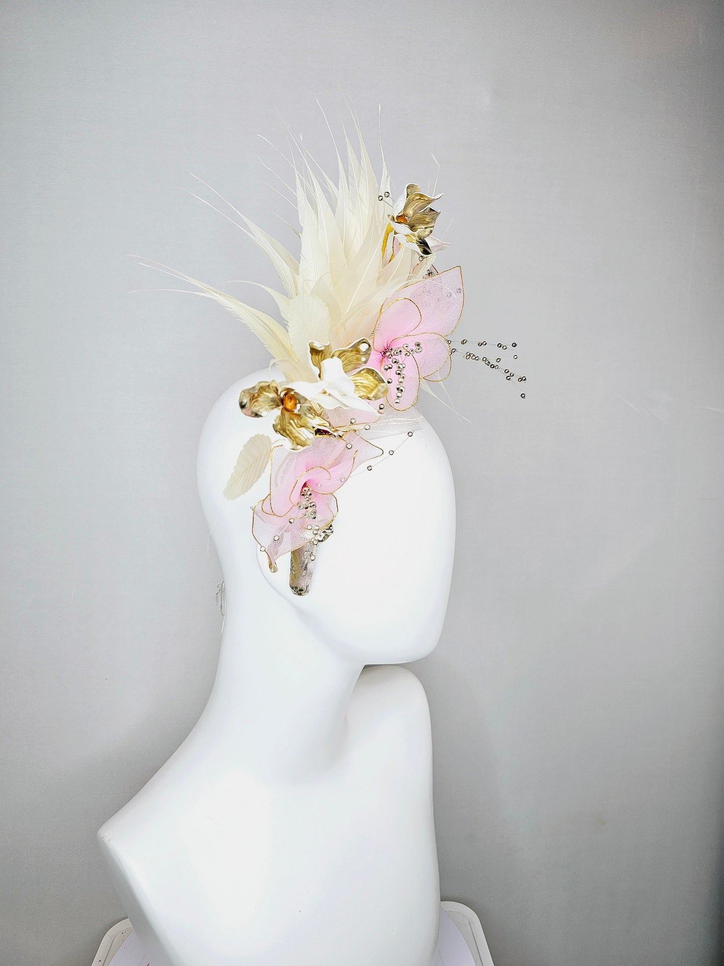 kentucky derby hat fascinator light pink and gold flowers with ivory cream feathers on champagne crystal gold rhinestone beaded headband