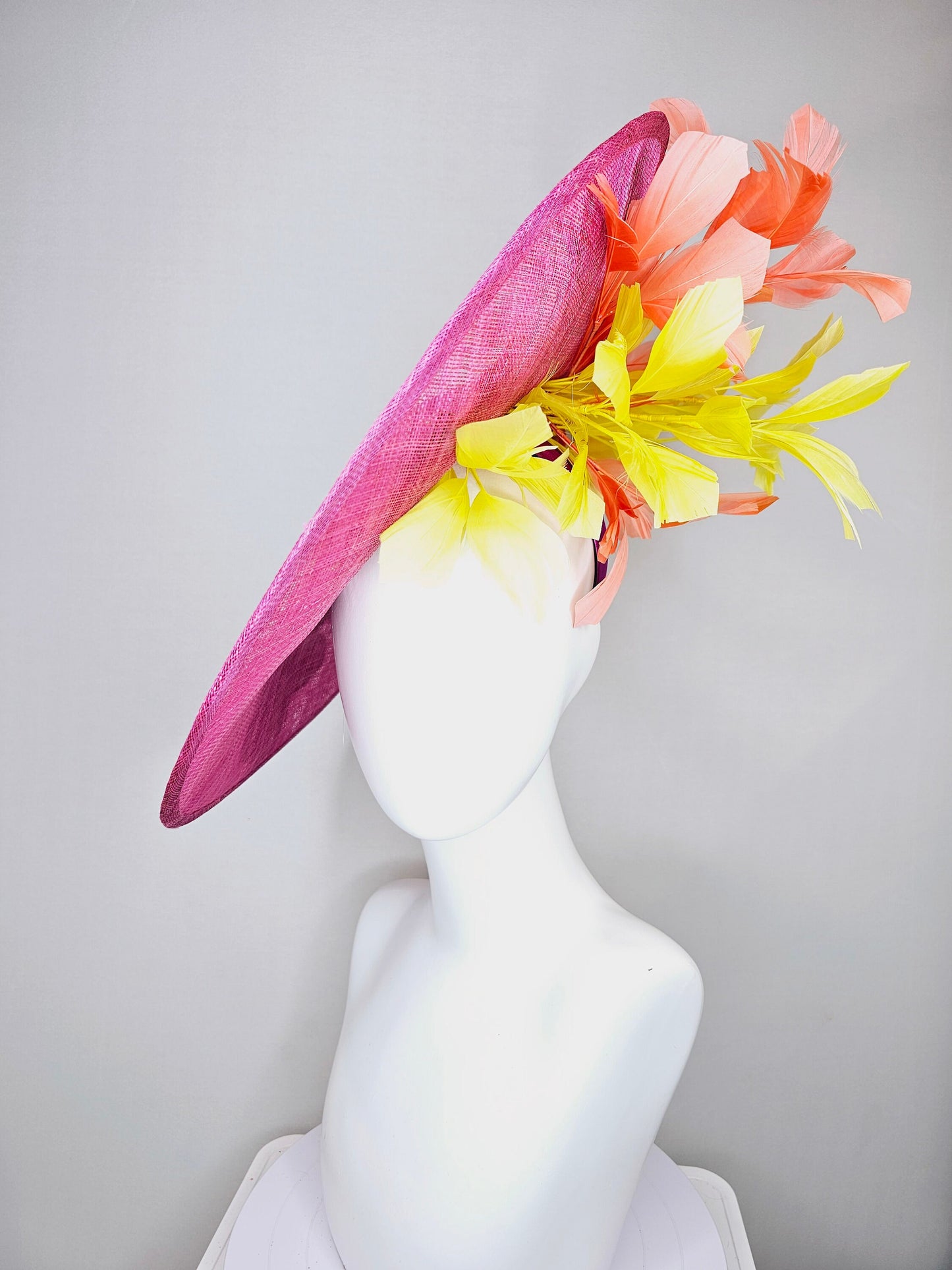 kentucky derby hat fascinator large pink sinamay saucer with yellow coral purple pink ivory embroidered flowers and orange yellow feathers