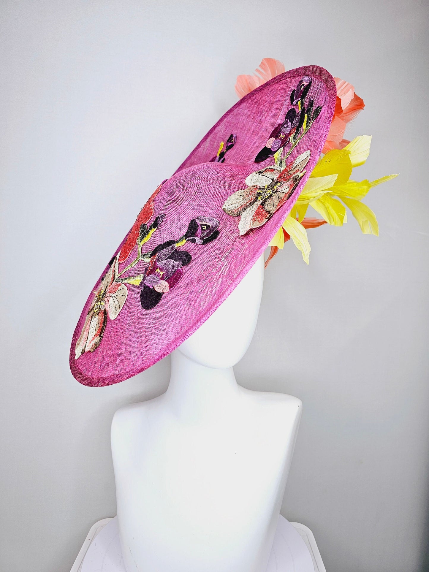 kentucky derby hat fascinator large pink sinamay saucer with yellow coral purple pink ivory embroidered flowers and orange yellow feathers