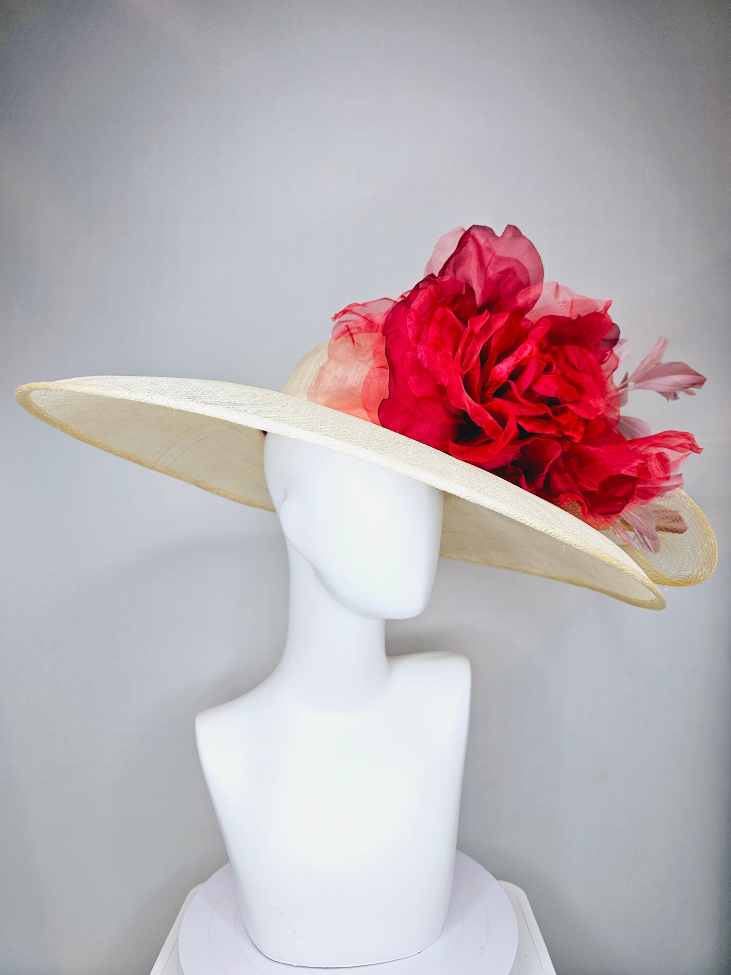 kentucky derby hat large wide brim sinamay neutral taupe beige hat with large red organza flower and blush pink feathers with gold crinoline