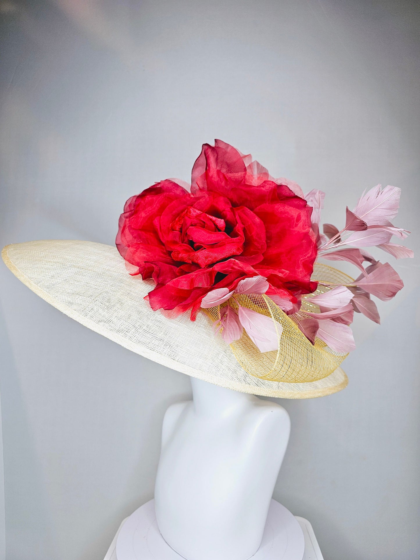 kentucky derby hat large wide brim sinamay neutral taupe beige hat with large red organza flower and blush pink feathers with gold crinoline