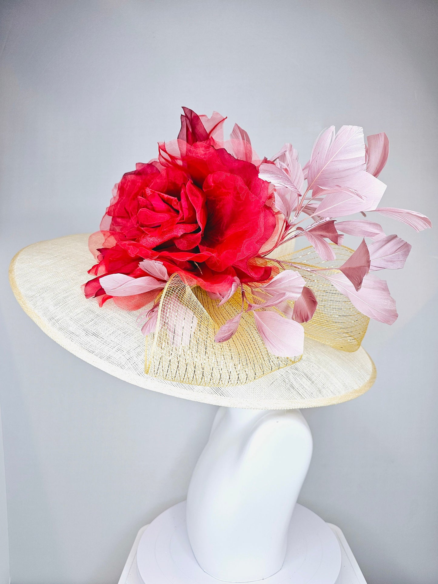 kentucky derby hat large wide brim sinamay neutral taupe beige hat with large red organza flower and blush pink feathers with gold crinoline