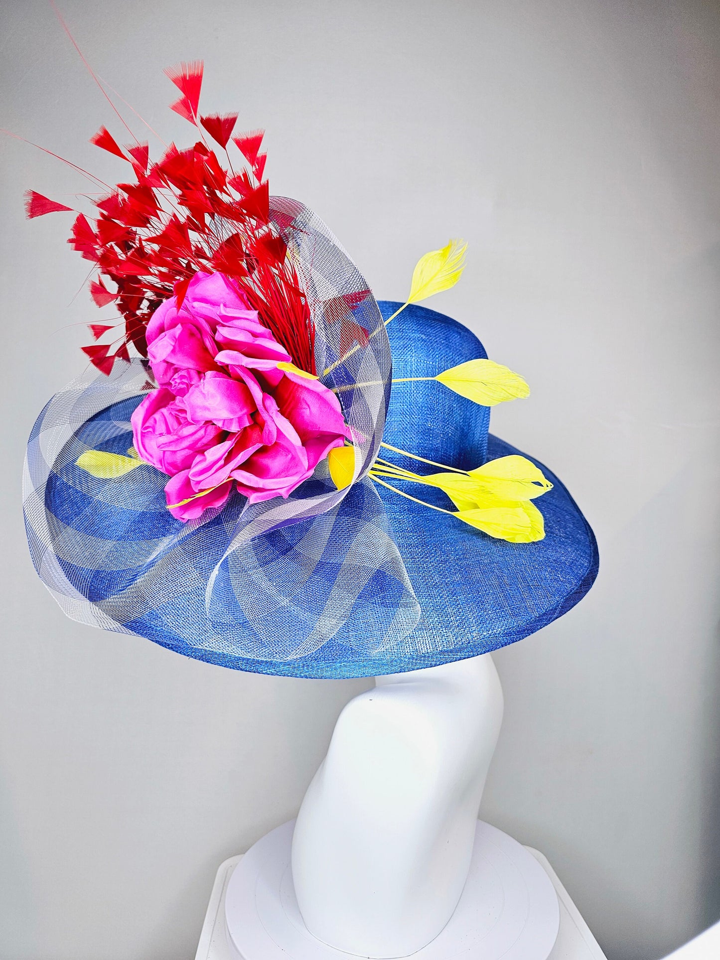 kentucky derby hat large wide brim sinamay royal blue hat with red and yellow feathers, bright pink satin flower w gingham plaid crinoline