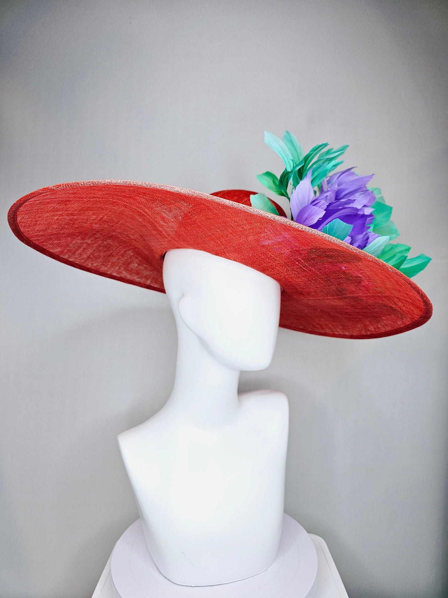 kentucky derby hat large wide brim sinamay orange coral hat with green feathers and purple fluffy feather flowers w pink crinoline