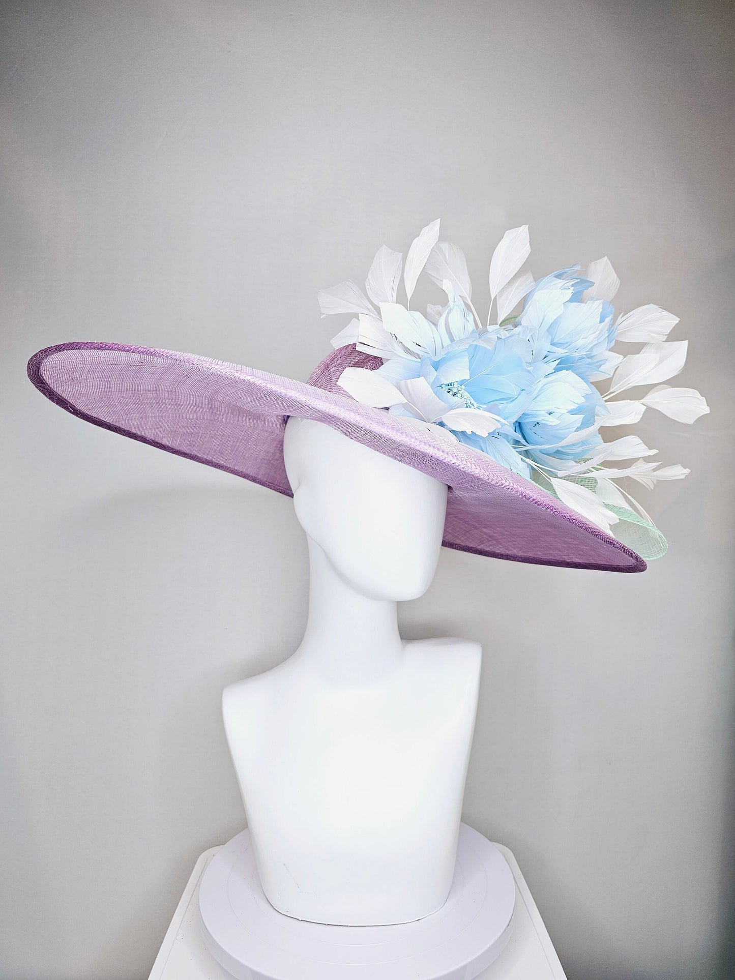 kentucky derby hat large wide brim sinamay purple lavender hat with baby blue feather flowers, white ivory feathers and mint green crinoline