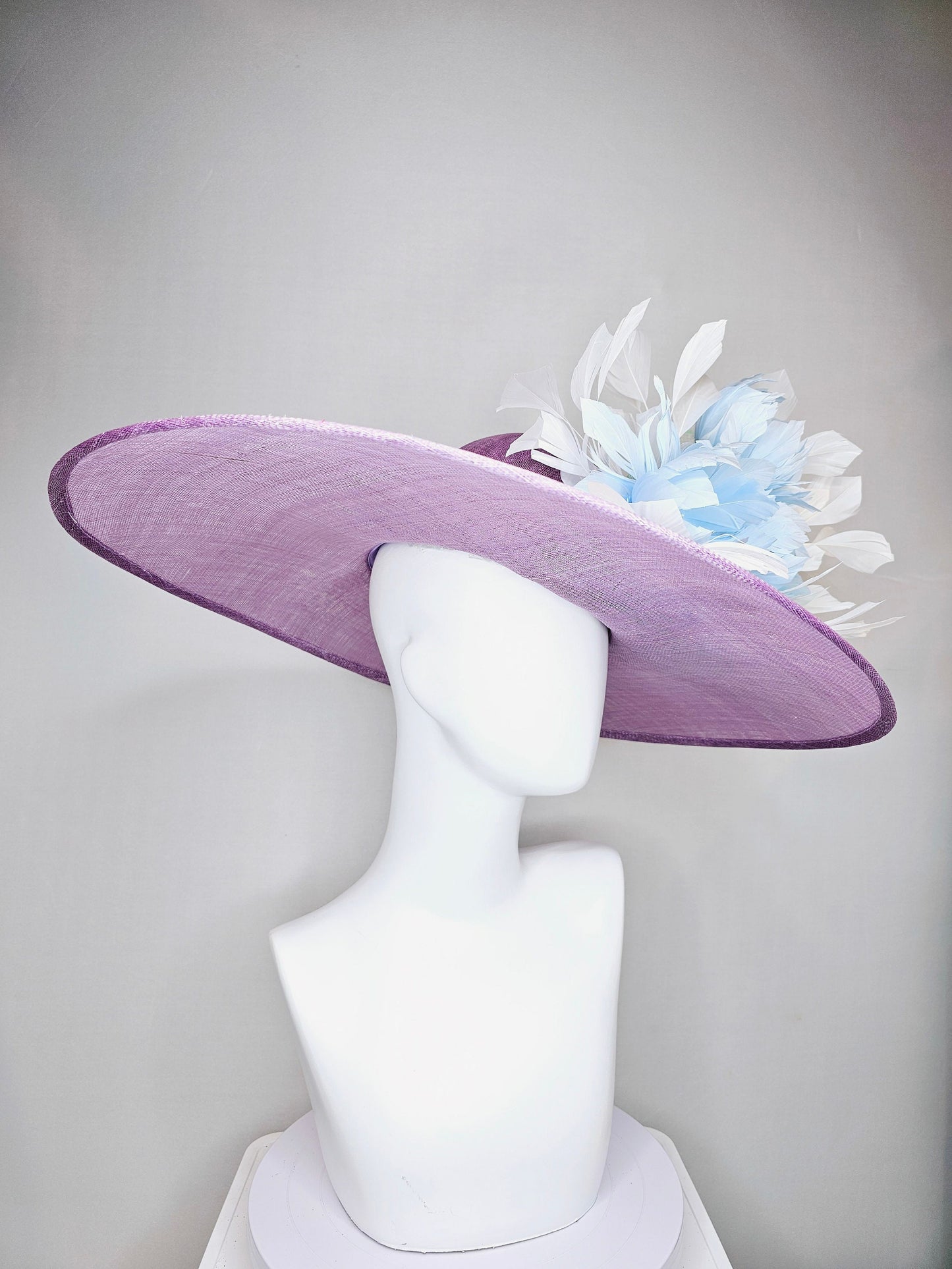 kentucky derby hat large wide brim sinamay purple lavender hat with baby blue feather flowers, white ivory feathers and mint green crinoline