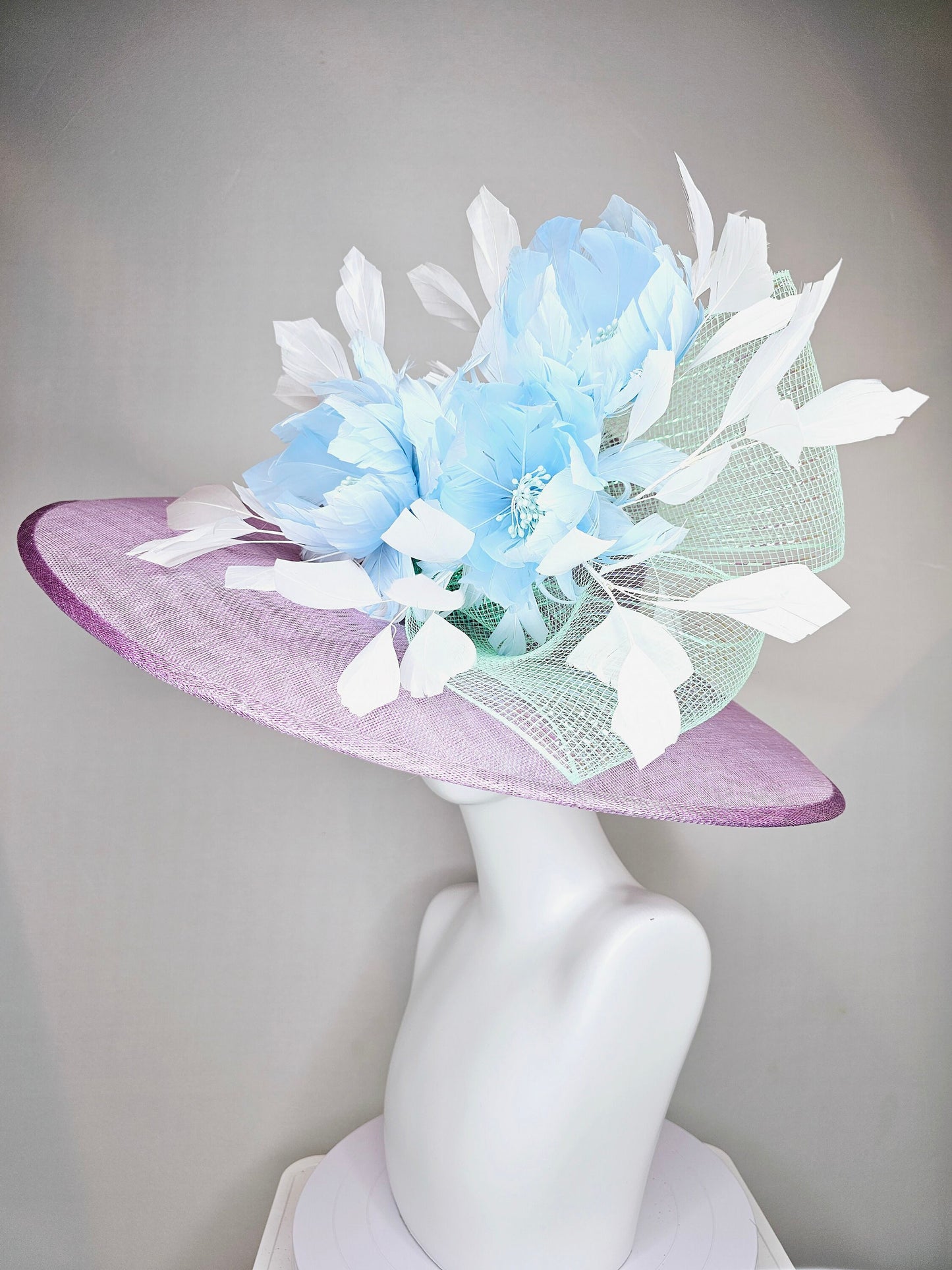 kentucky derby hat large wide brim sinamay purple lavender hat with baby blue feather flowers, white ivory feathers and mint green crinoline