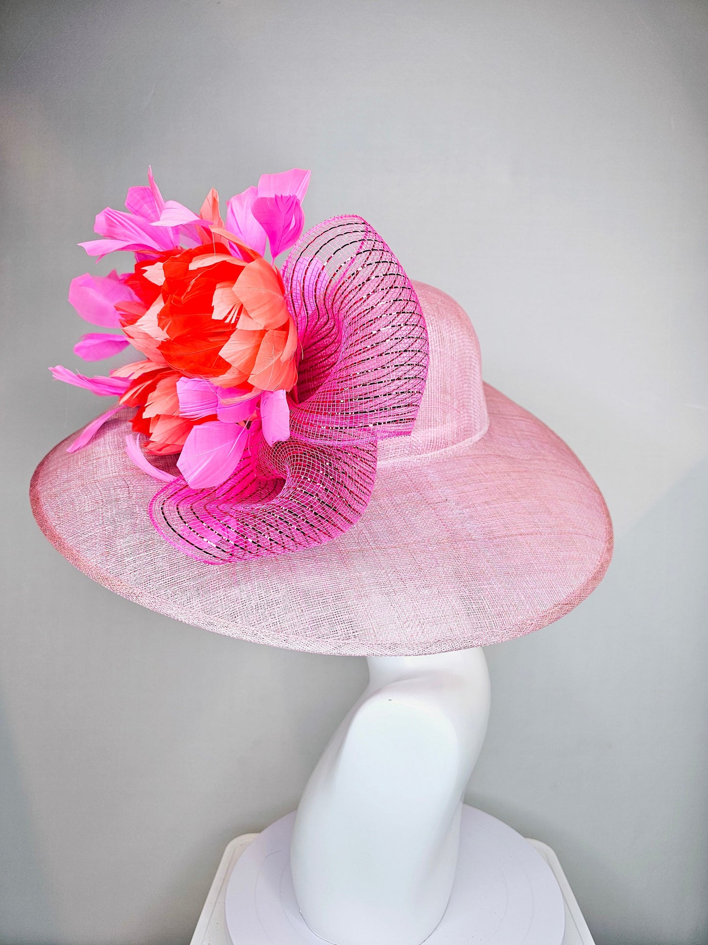 kentucky derby hat large wide brim sinamay light pink hat with large orange coral feather flowers and fuchsia pink feathers w pink crinoline