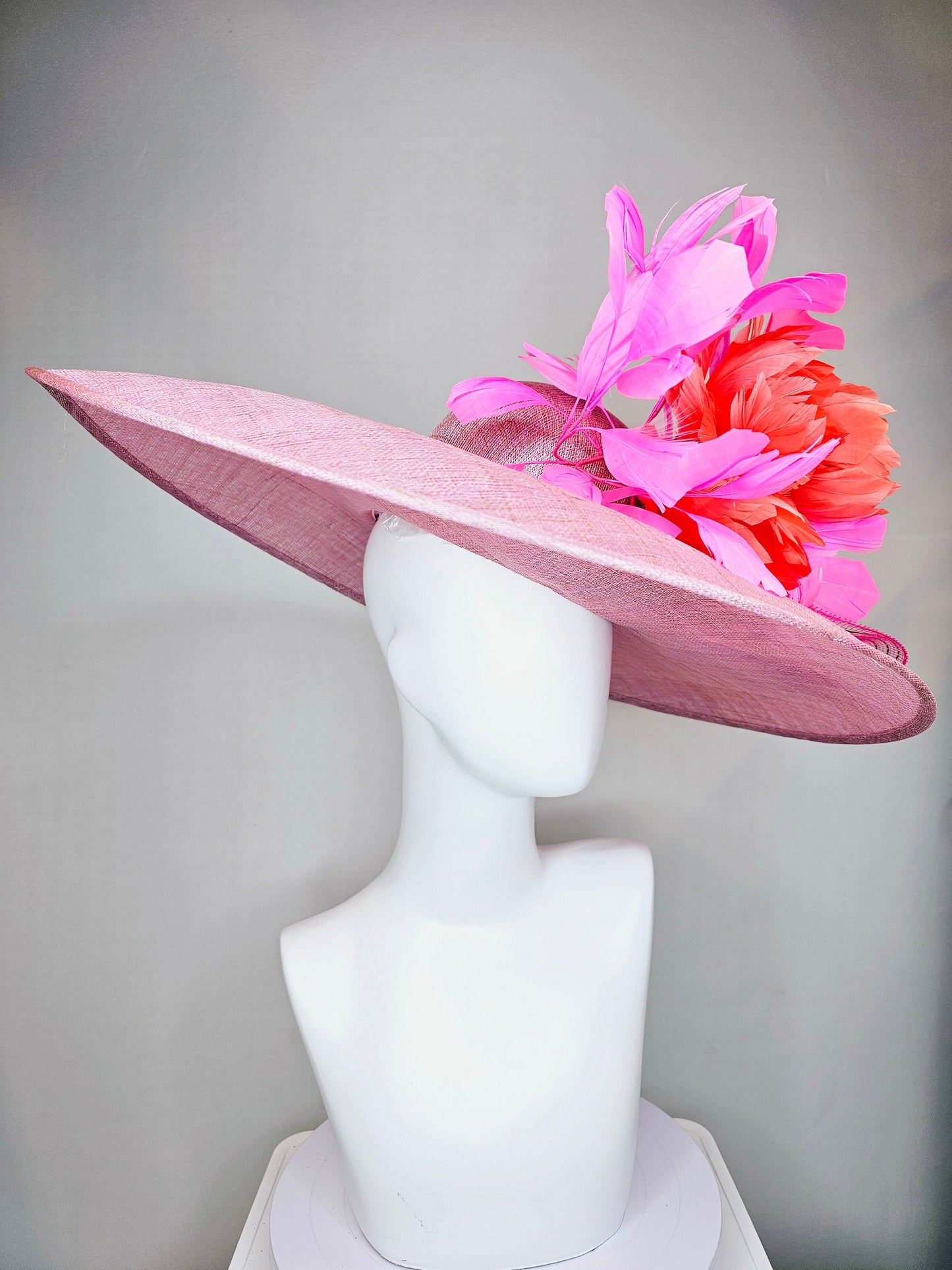 kentucky derby hat large wide brim sinamay light pink hat with large orange coral feather flowers and fuchsia pink feathers w pink crinoline