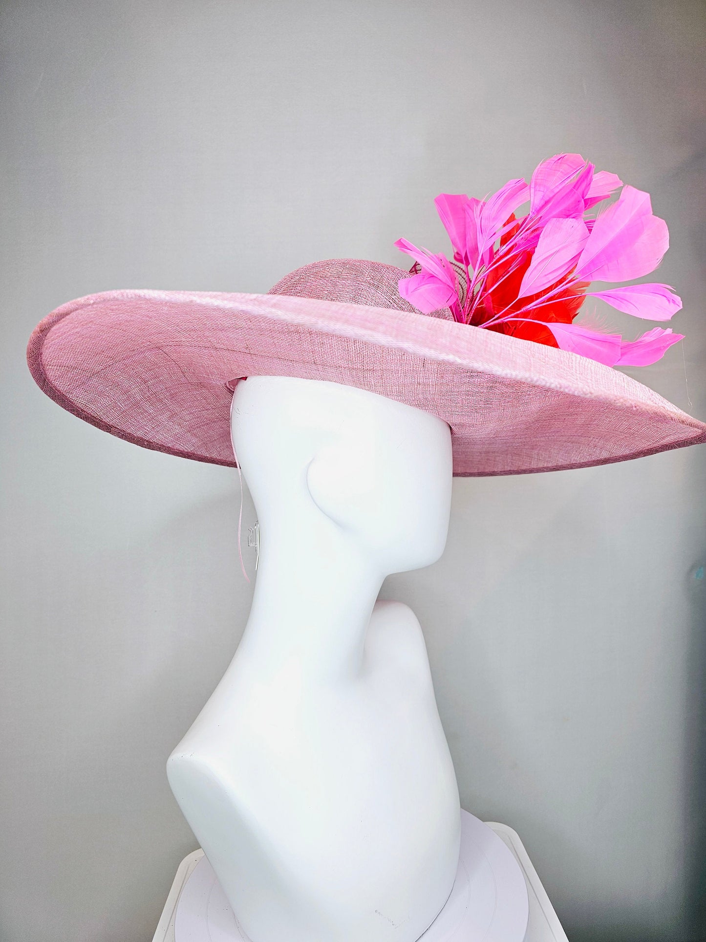 kentucky derby hat large wide brim sinamay light pink hat with large orange coral feather flowers and fuchsia pink feathers w pink crinoline