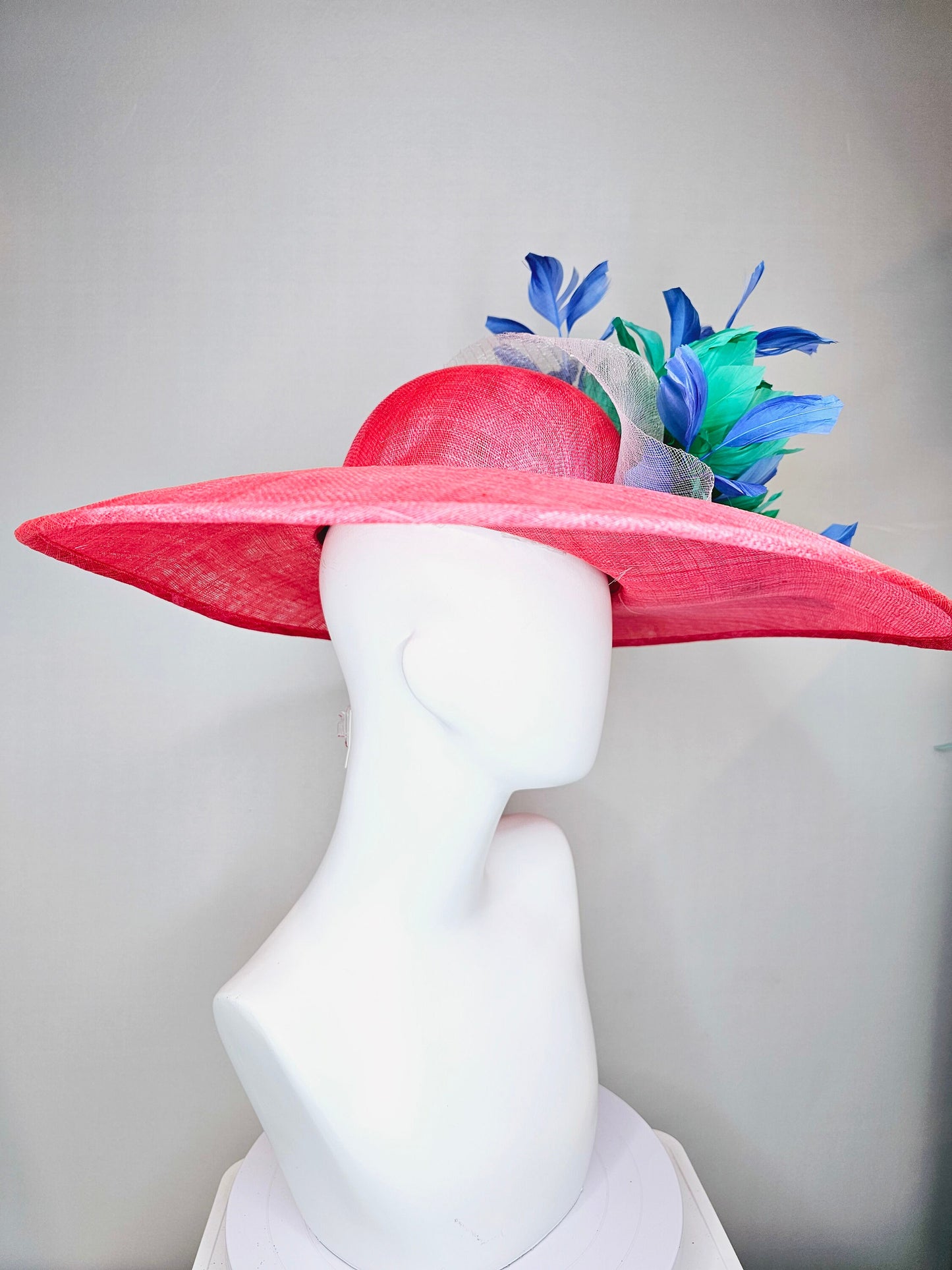 kentucky derby hat large wide brim sinamay coral hat w emerald green feather flowers, royal blue feathers and white ivory crinoline