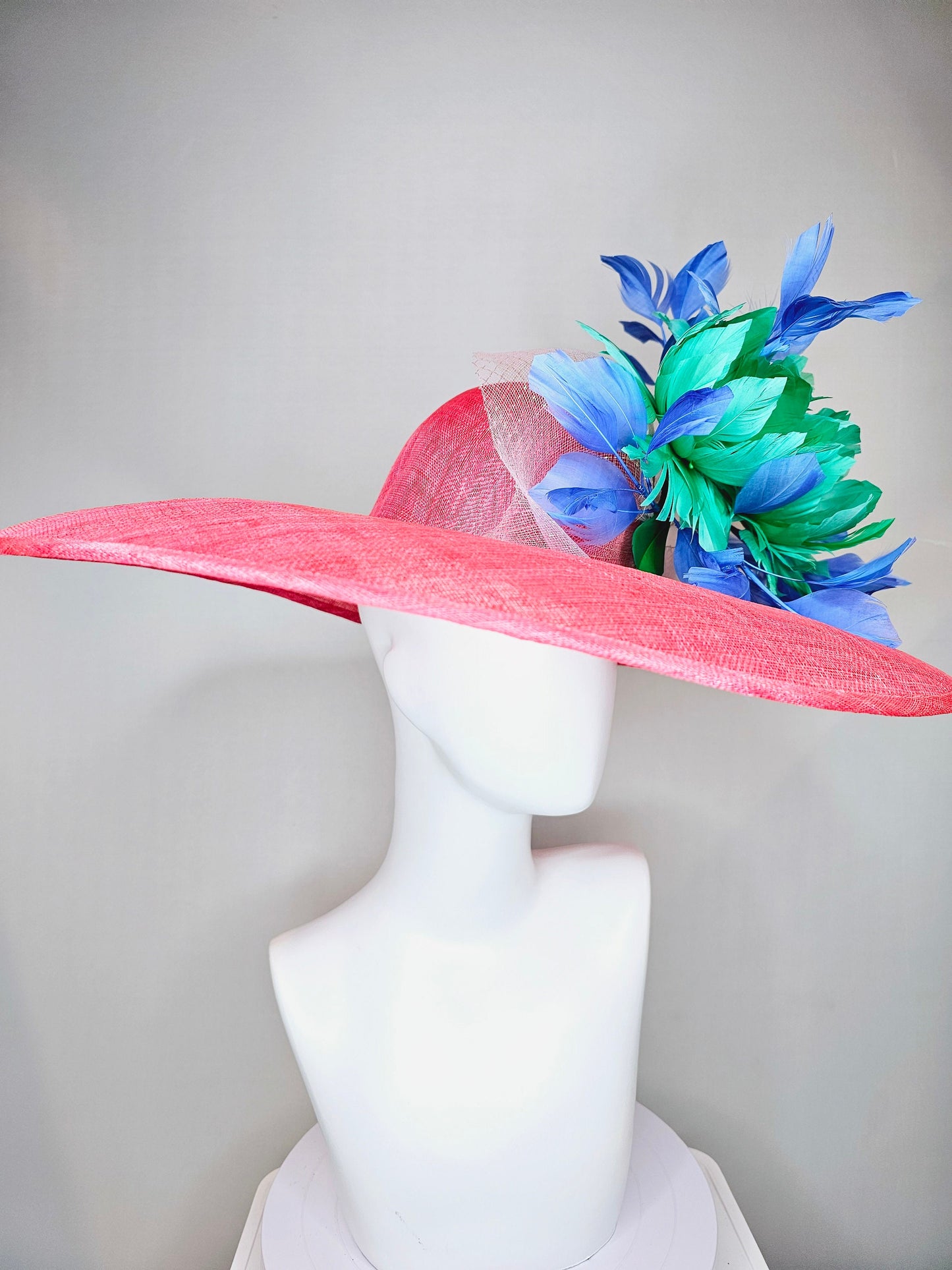 kentucky derby hat large wide brim sinamay coral hat w emerald green feather flowers, royal blue feathers and white ivory crinoline