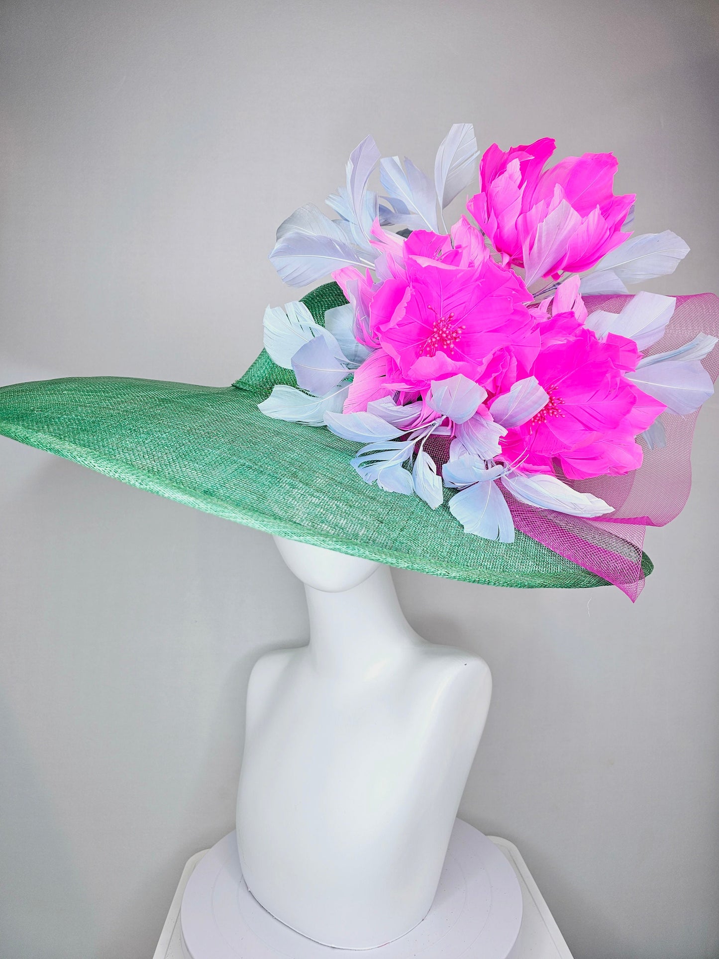 kentucky derby hat large wide brim sinamay emerald green hat with fuchsia pink feather flower and lavender feathers with pink crinoline