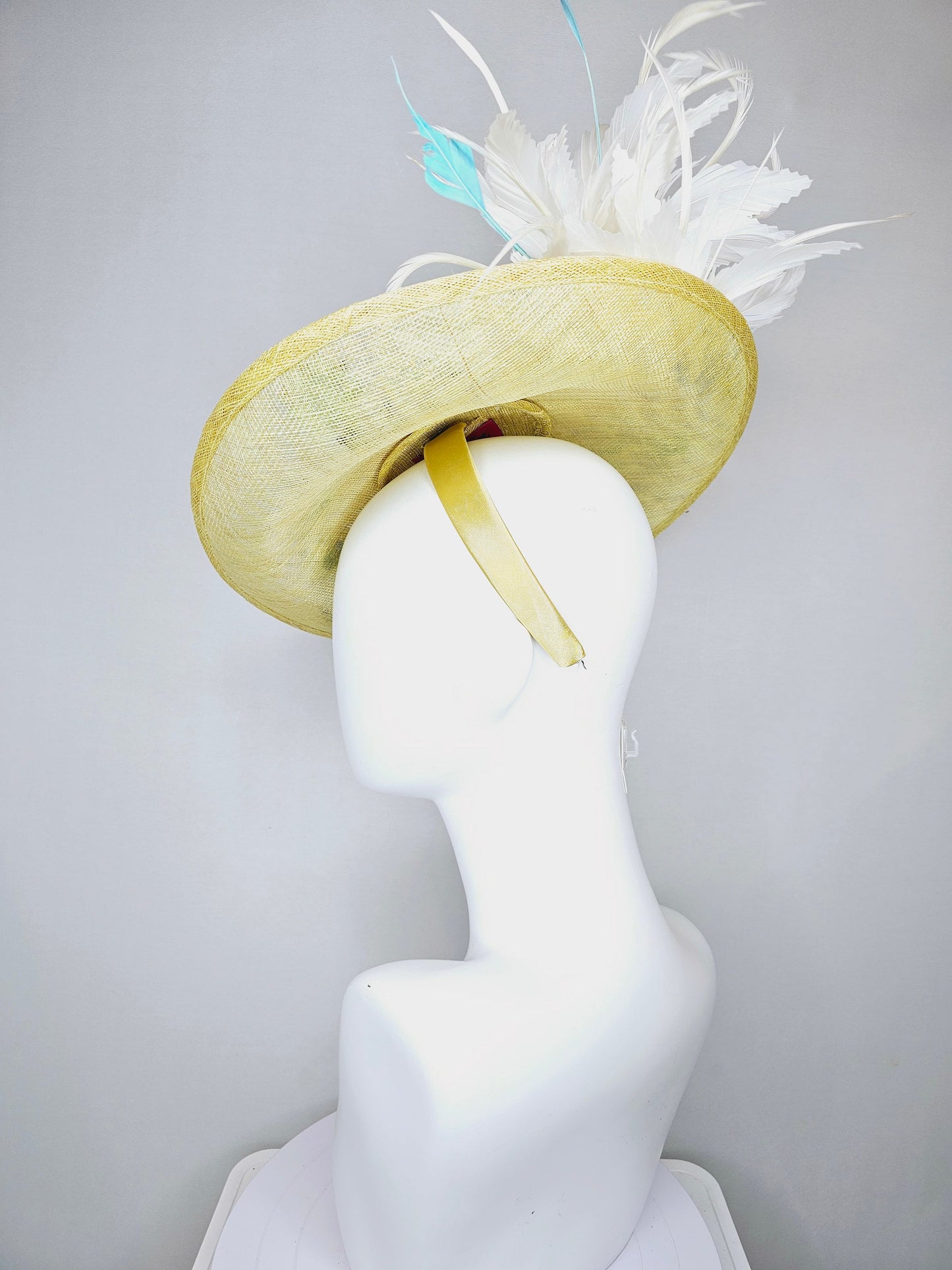 kentucky derby hat fascinator yellow sinamay saucer with white and blue feathers with blue crystal jewel beaded flowers