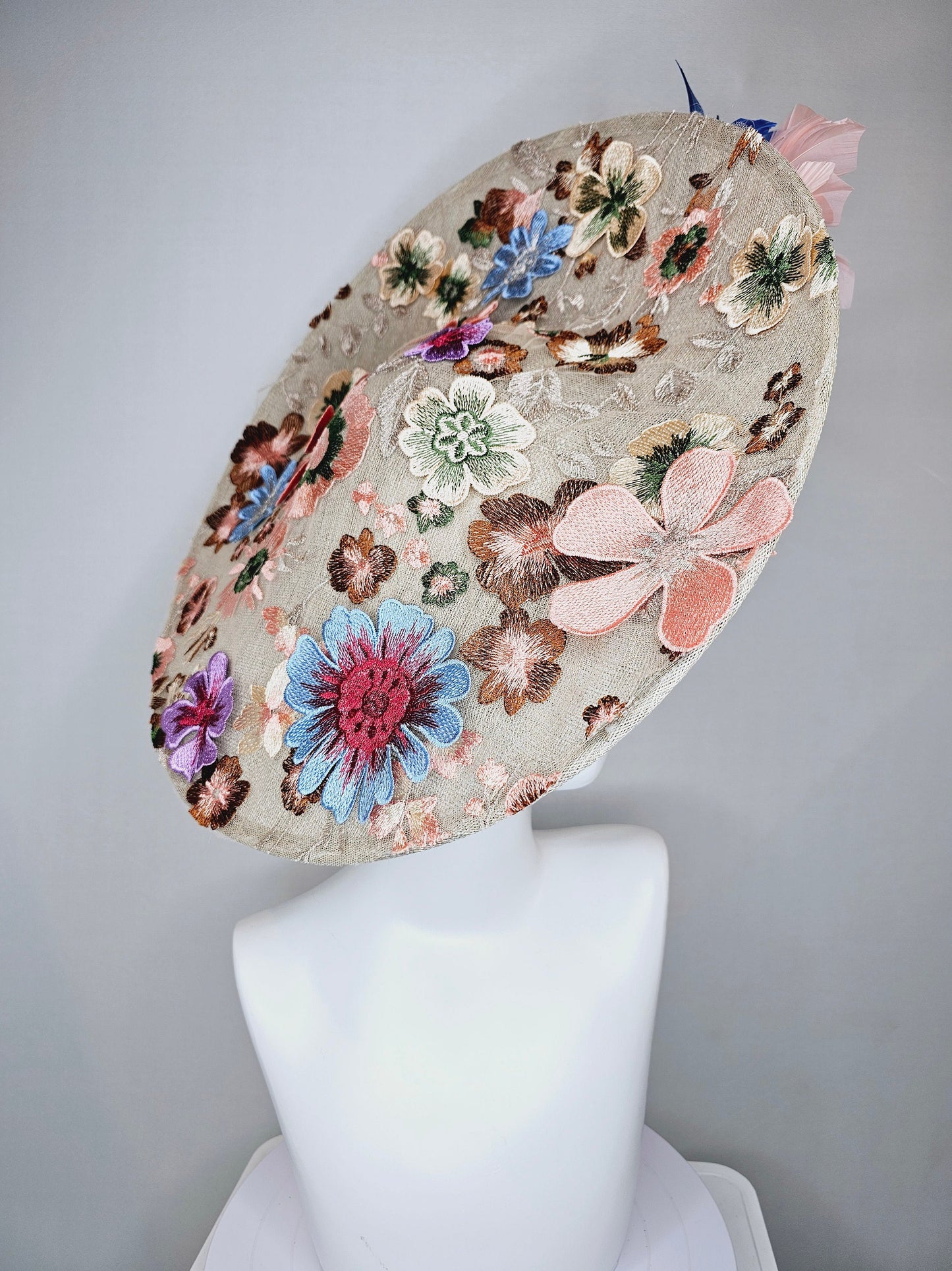 kentucky derby hat fascinator taupe beige neutral large saucer sinamay rainbow floral embroidered decor with pink blue branching feathers