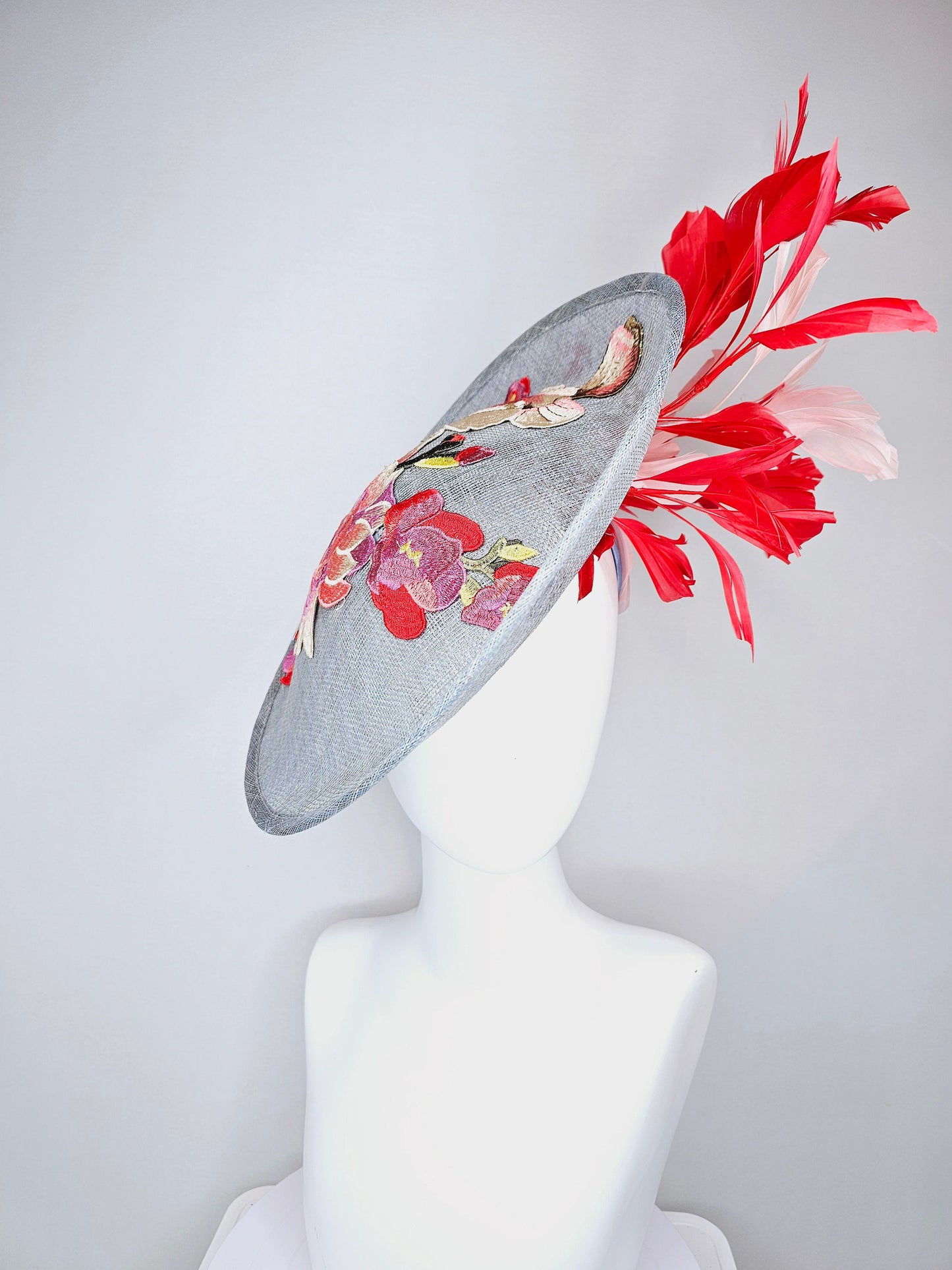 kentucky derby hat gray blue sinamay saucer with red burgundy pink embroidered flowers with blush light pink and red feathers