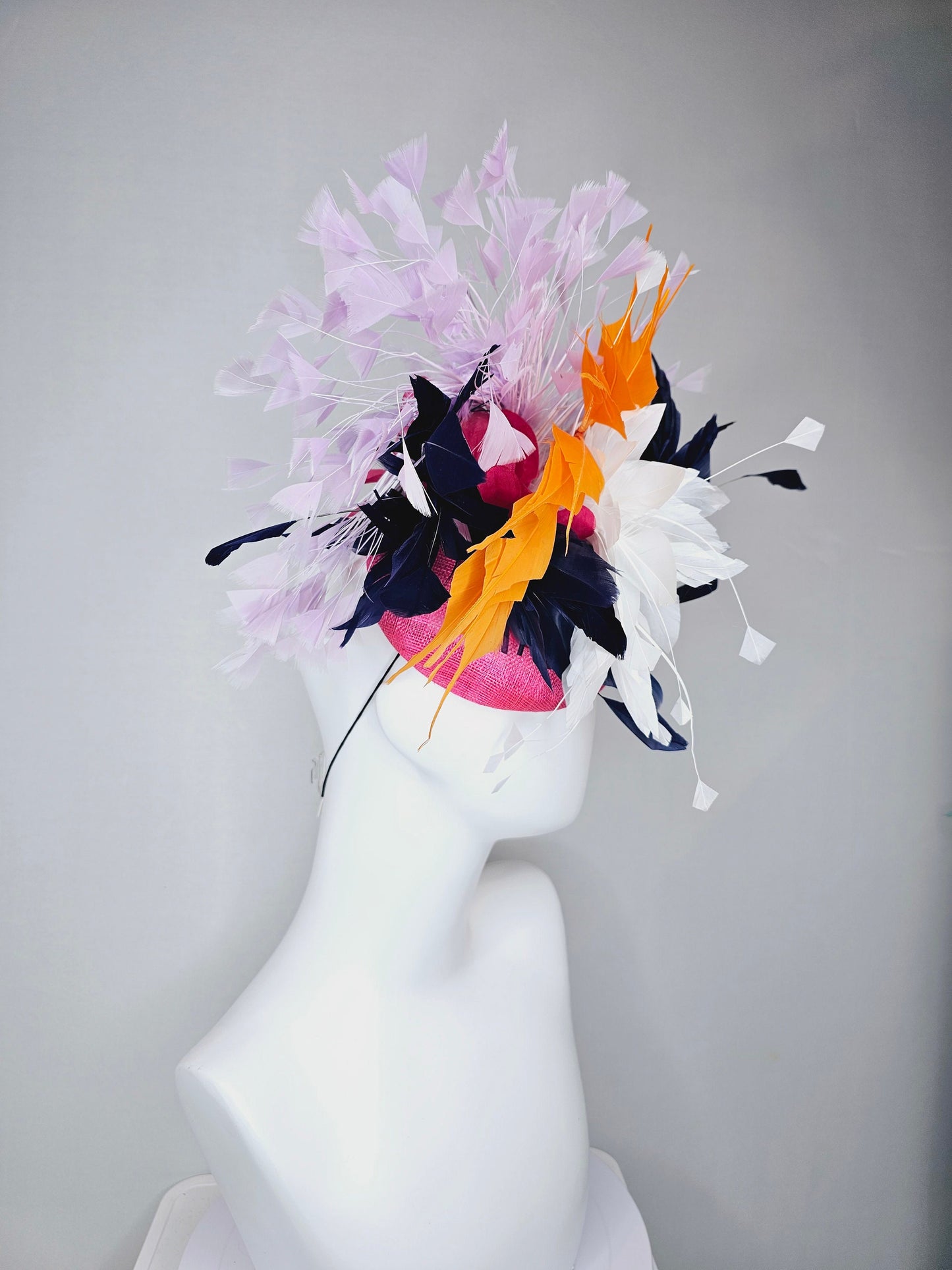 kentucky derby hat fascinator hot pink sinamay with navy blue, white ivory, apricot orange yellow, and lavender purple branching feathers