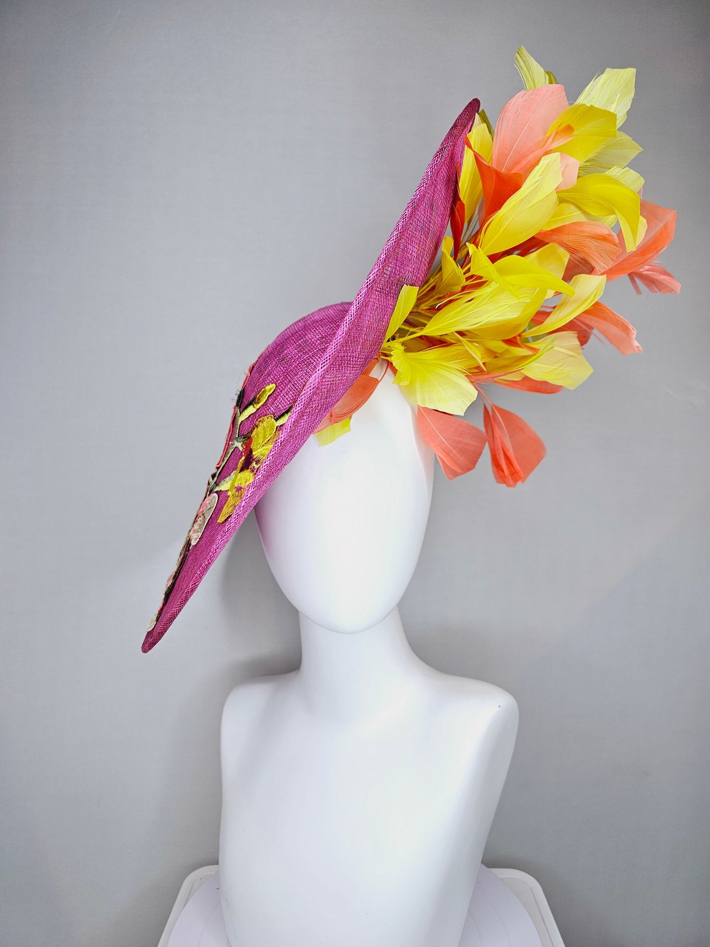 kentucky derby hat fascinator mulberry purple sinamay saucer with yellow coral purple pink embroidered flowers and peach yellow feathers